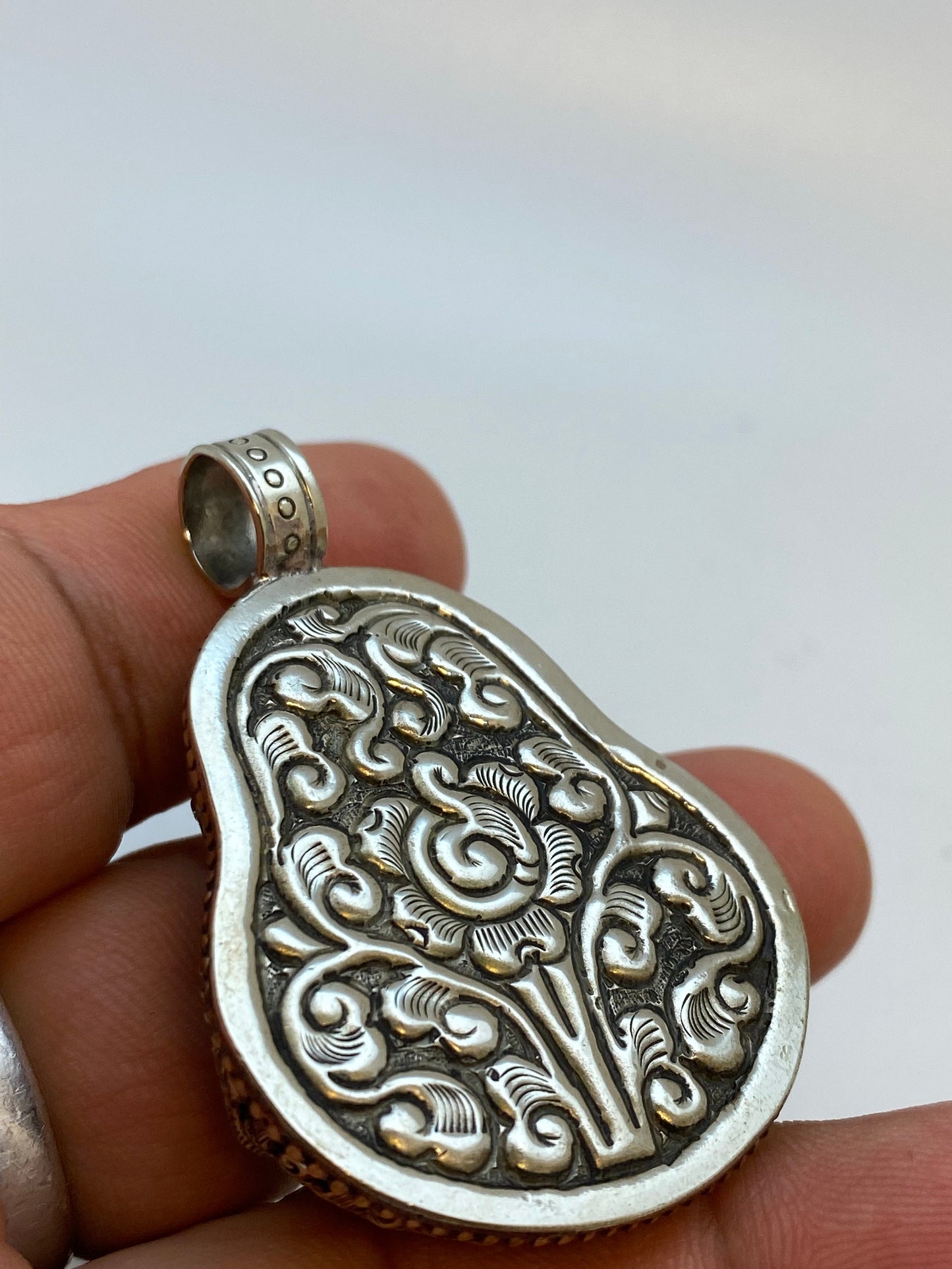 Handcrafted Labradorite Laughing Buddha Pendant: Tibetan Silver Design