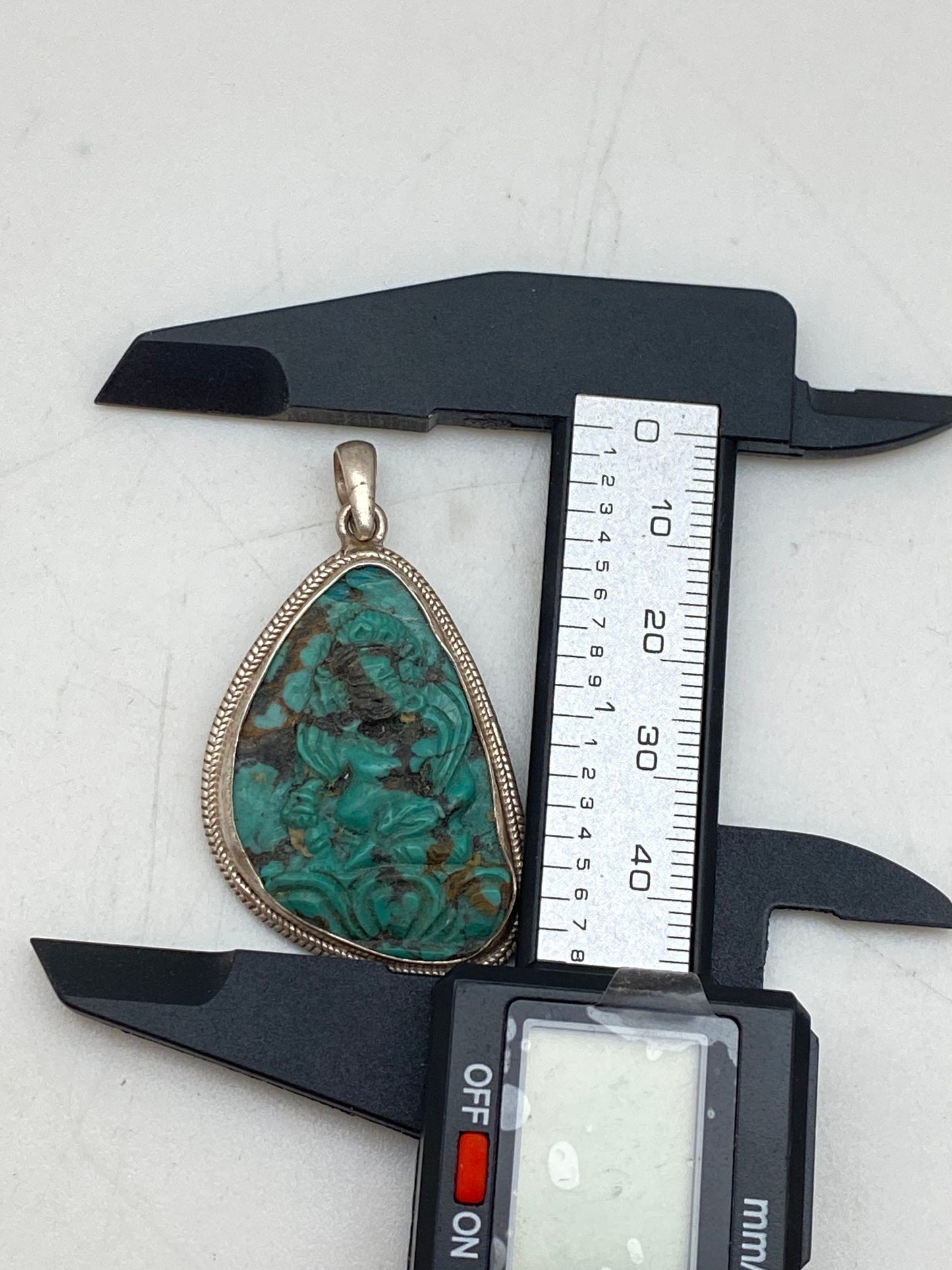 Handcrafted Turquoise Zambala Pendant: Sterling Silver Tibetan Amulet