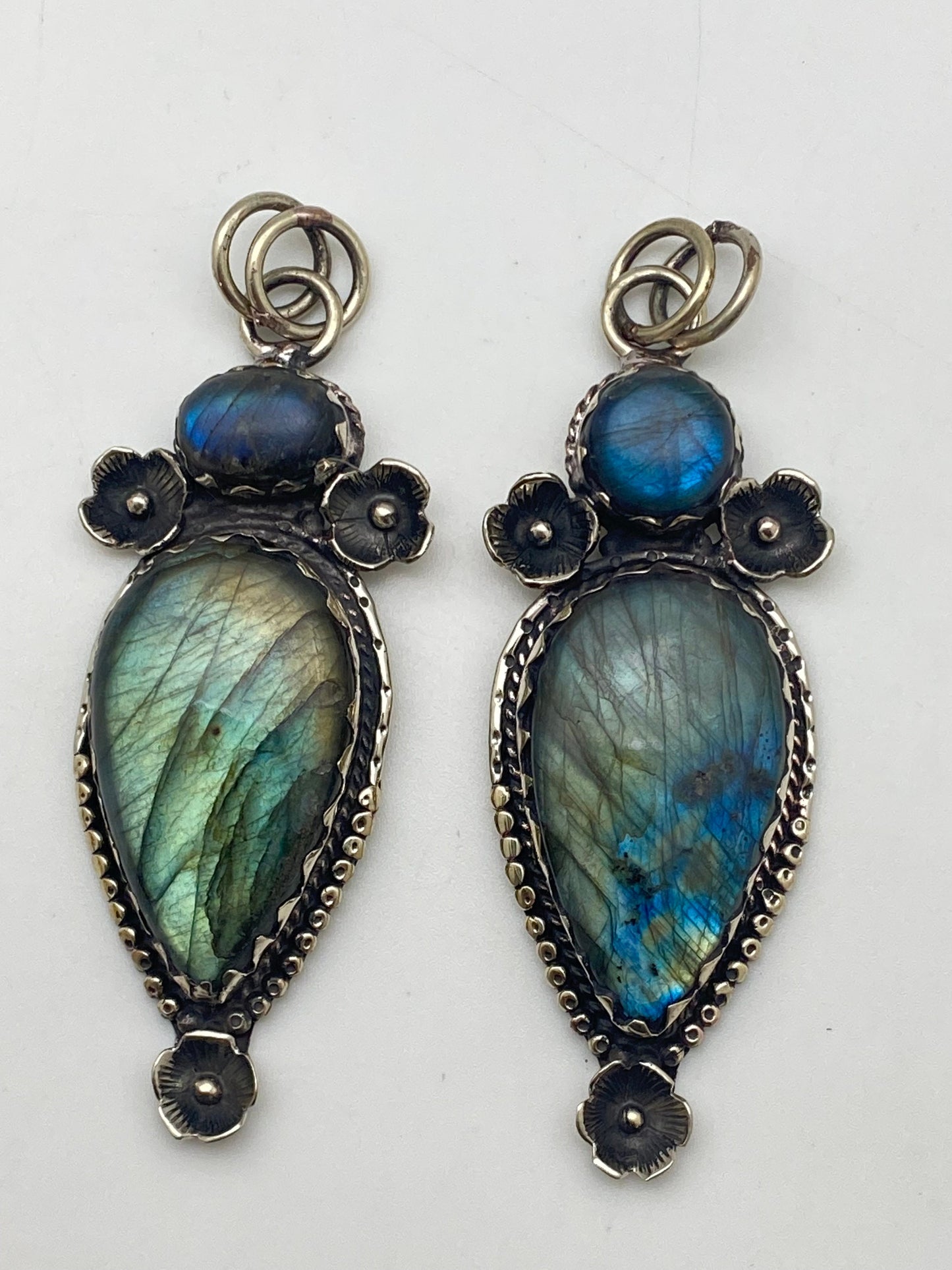 Handcrafted Labradorite Pendant: Tibetan Silver Floral Design