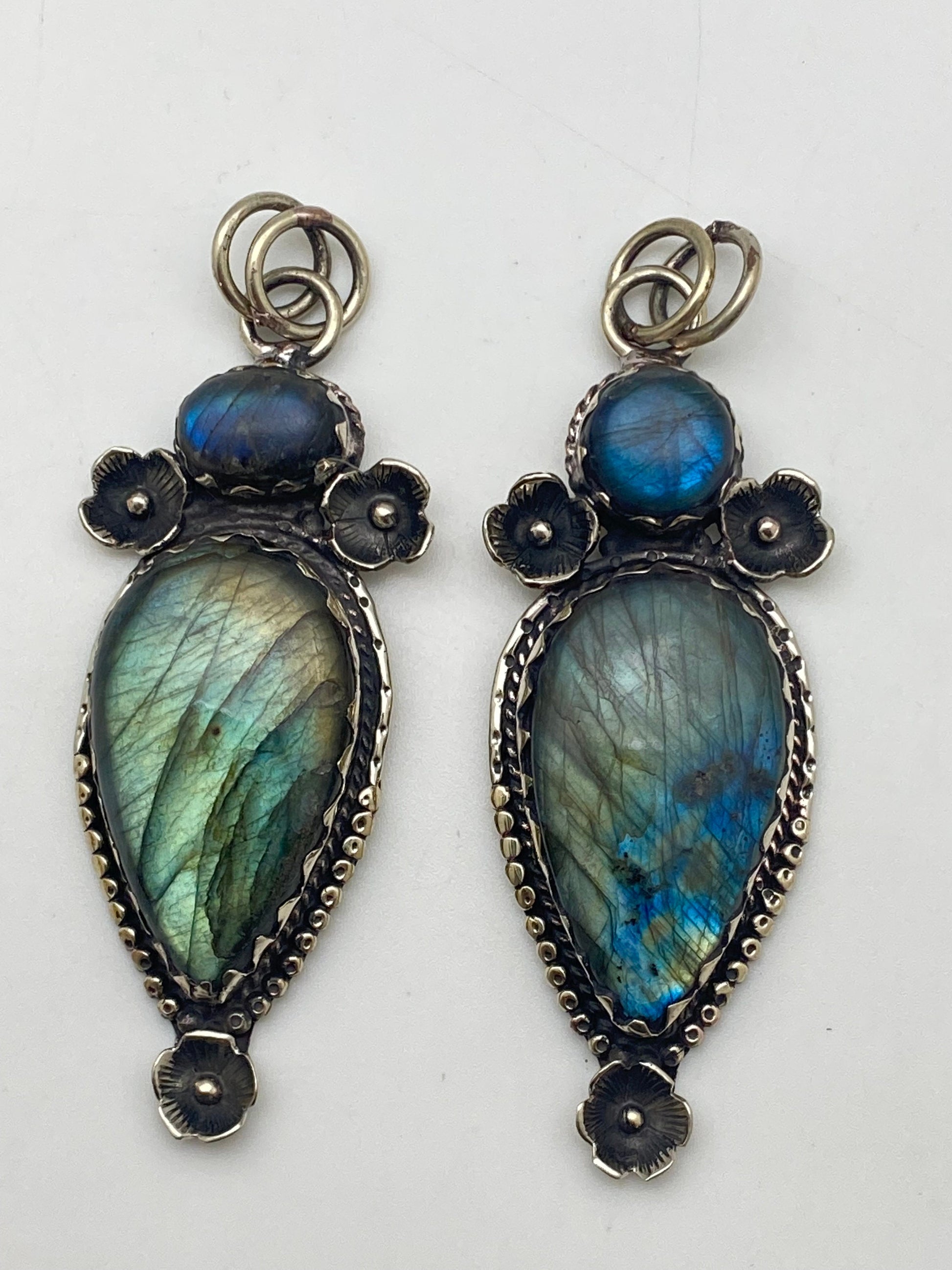 Handcrafted Labradorite Pendant: Tibetan Silver Floral Design