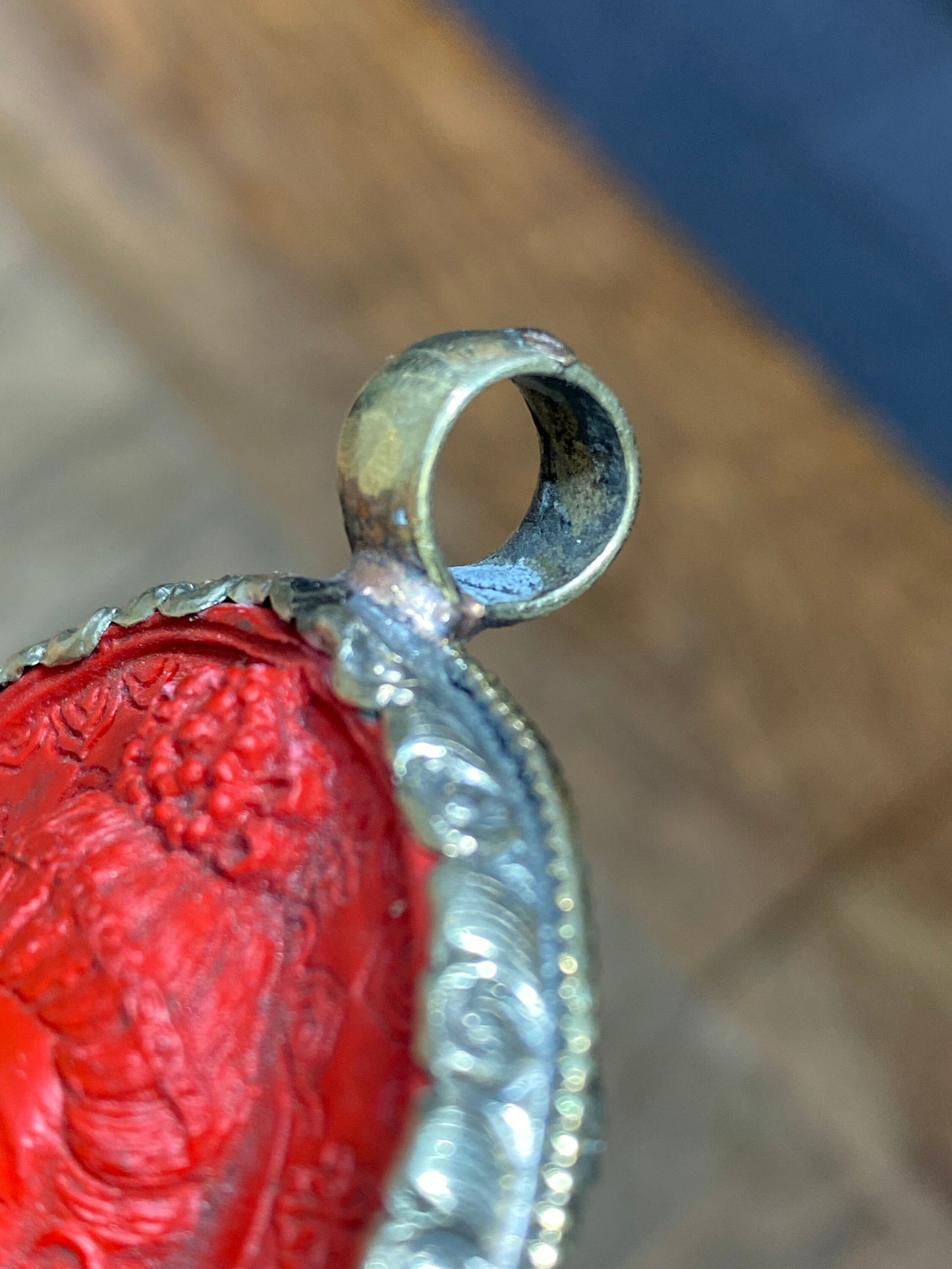 Hand Carved Cinnabar Buddha Pendant: Tibetan Silver Amulet