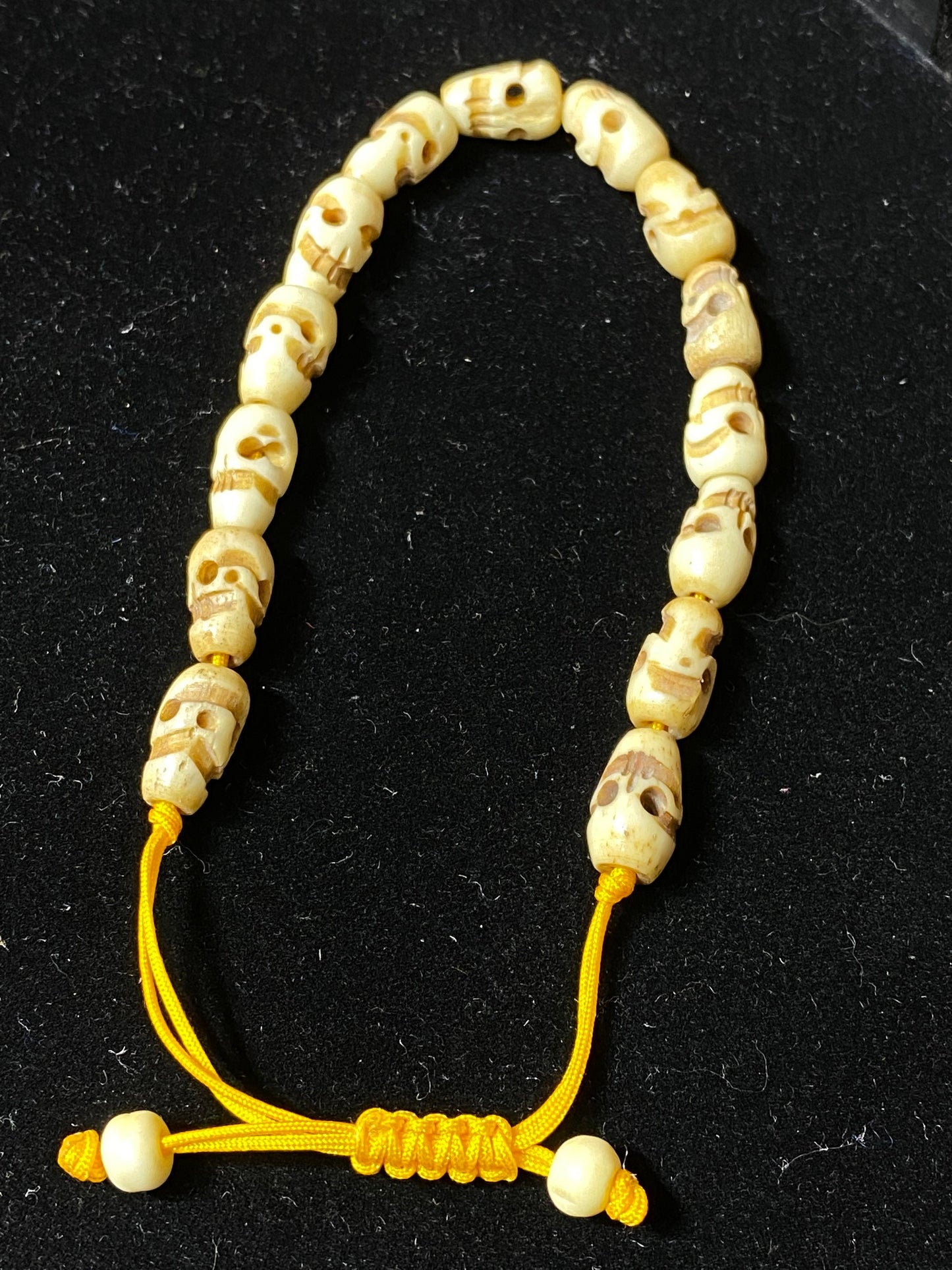 wrist mala,bracelet,bone carved skull, hand crafted, water buffalo bone