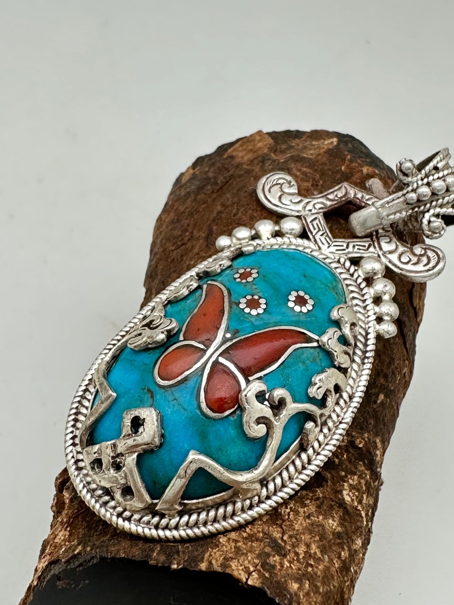 Butterfly pendant,sleeping beauty turquoise ,hand crafted, coral ,sterling silver,inlaid,tibetan design,handcarved,ethnic design,floral