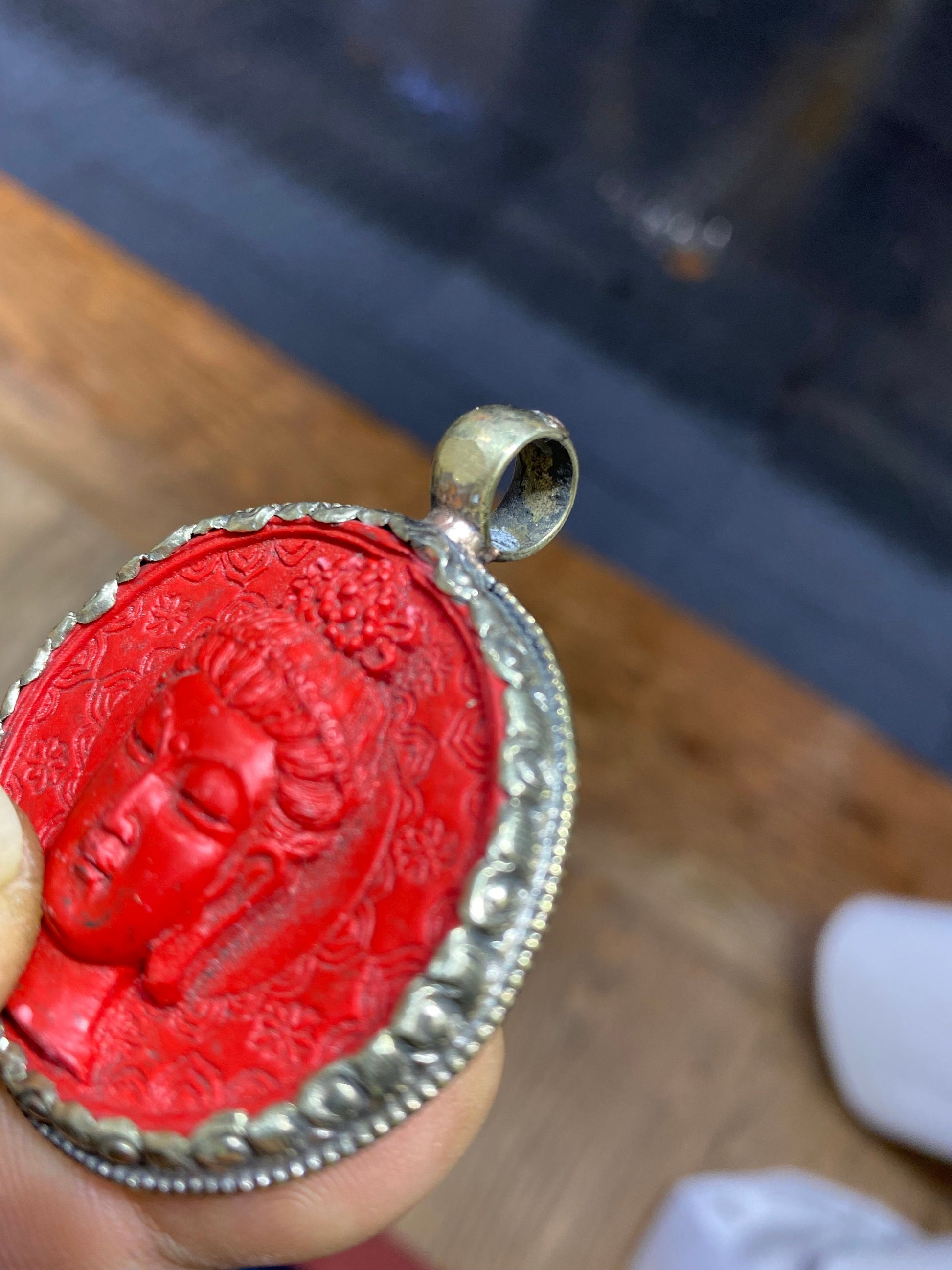 Hand Carved Cinnabar Buddha Pendant: Tibetan Silver Amulet