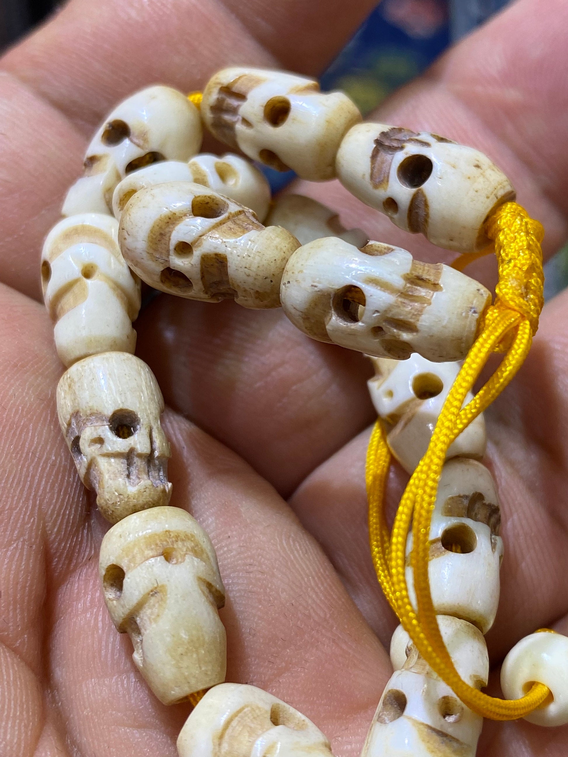 wrist mala,bracelet,bone carved skull, hand crafted, water buffalo bone