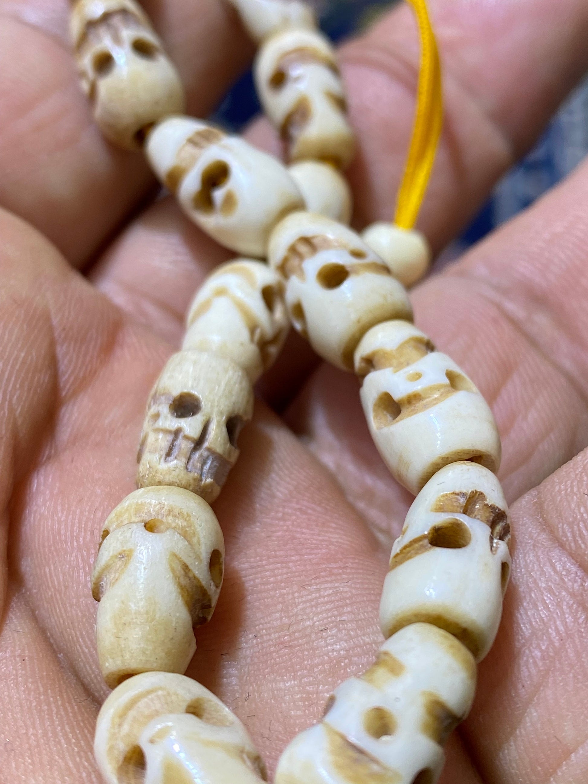 wrist mala,bracelet,bone carved skull, hand crafted, water buffalo bone