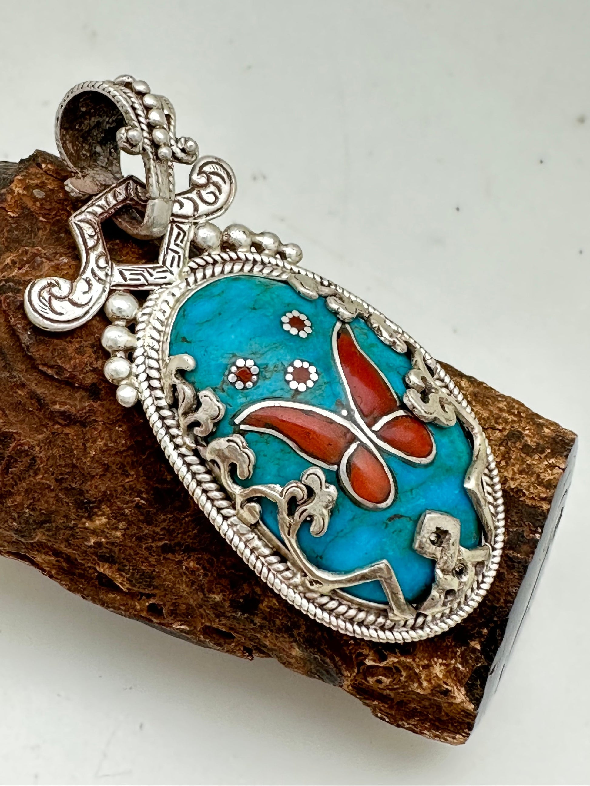 Butterfly pendant,sleeping beauty turquoise ,hand crafted, coral ,sterling silver,inlaid,tibetan design,handcarved,ethnic design,floral