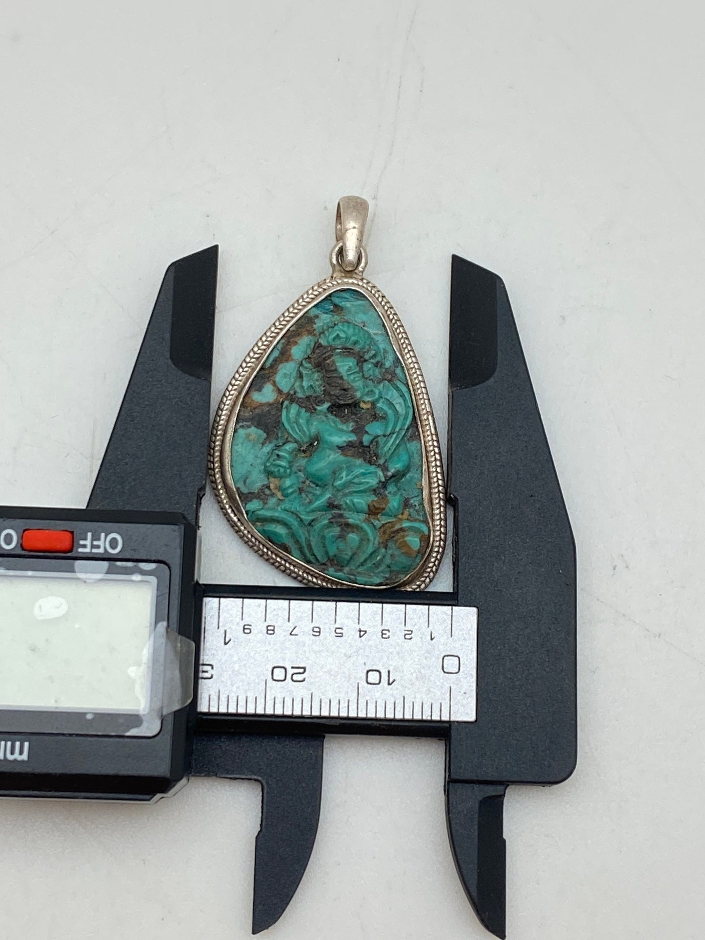 Handcrafted Turquoise Zambala Pendant: Sterling Silver Tibetan Amulet
