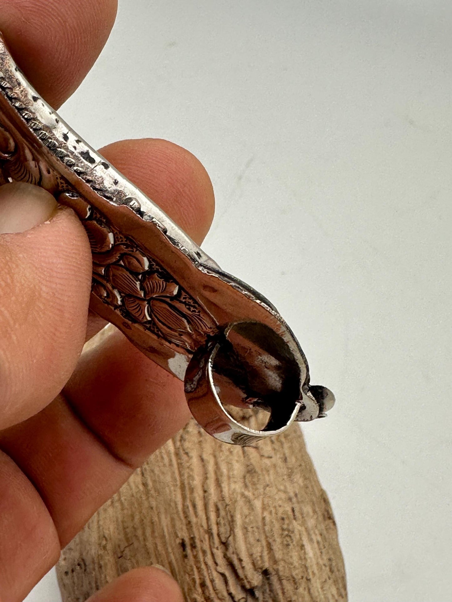 Handcrafted Bone Feather Pendant: Coin Silver Floral Design