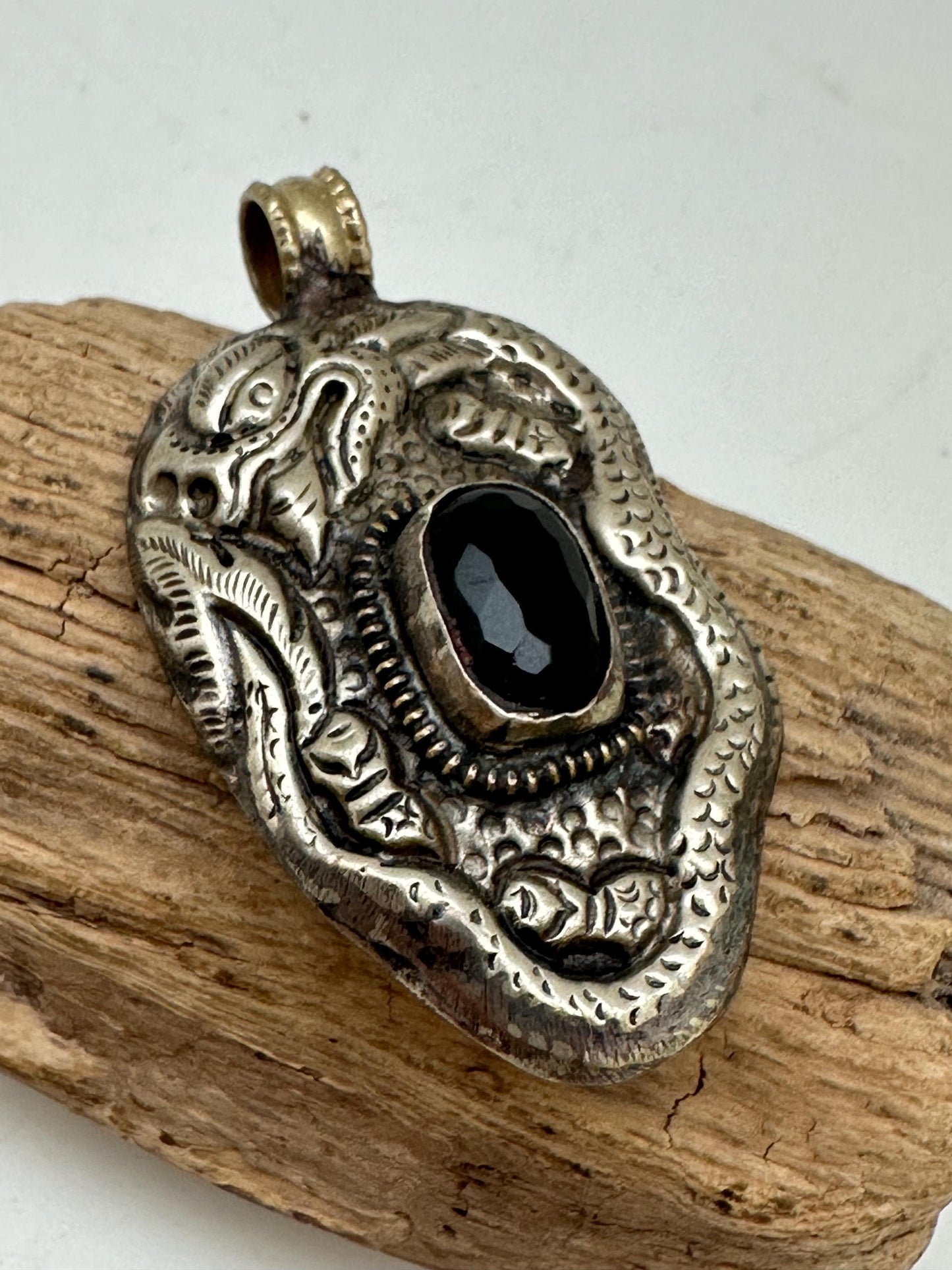 Dragon pendant, set with black onyx ,Tibetan repousse silver ,58mmX33mm