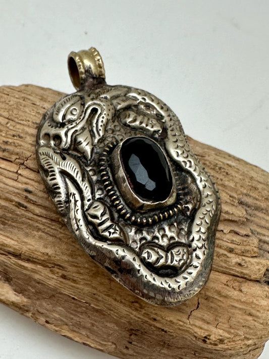 Dragon pendant, set with black onyx ,Tibetan repousse silver ,58mmX33mm
