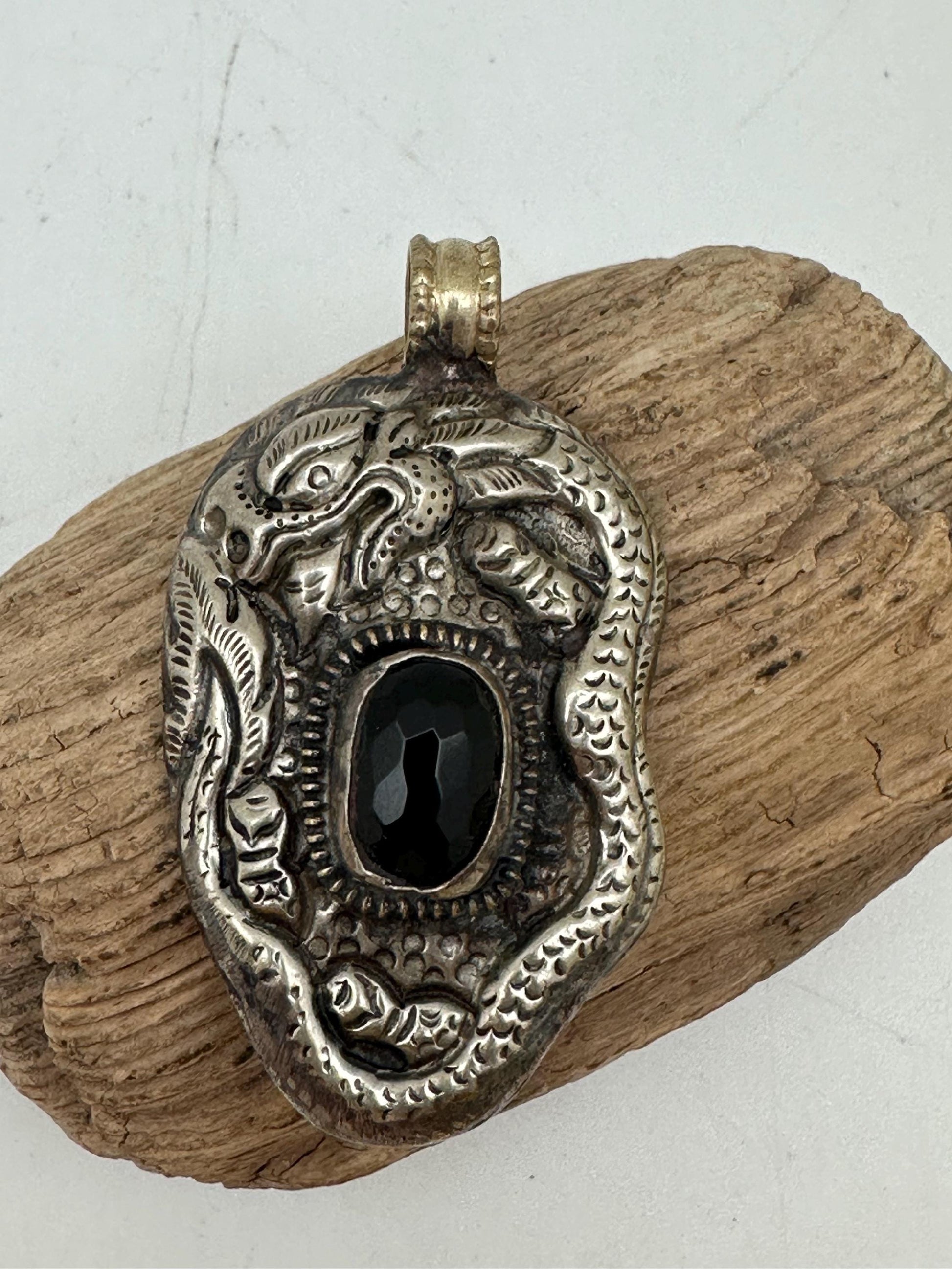 Dragon pendant, set with black onyx ,Tibetan repousse silver ,58mmX33mm