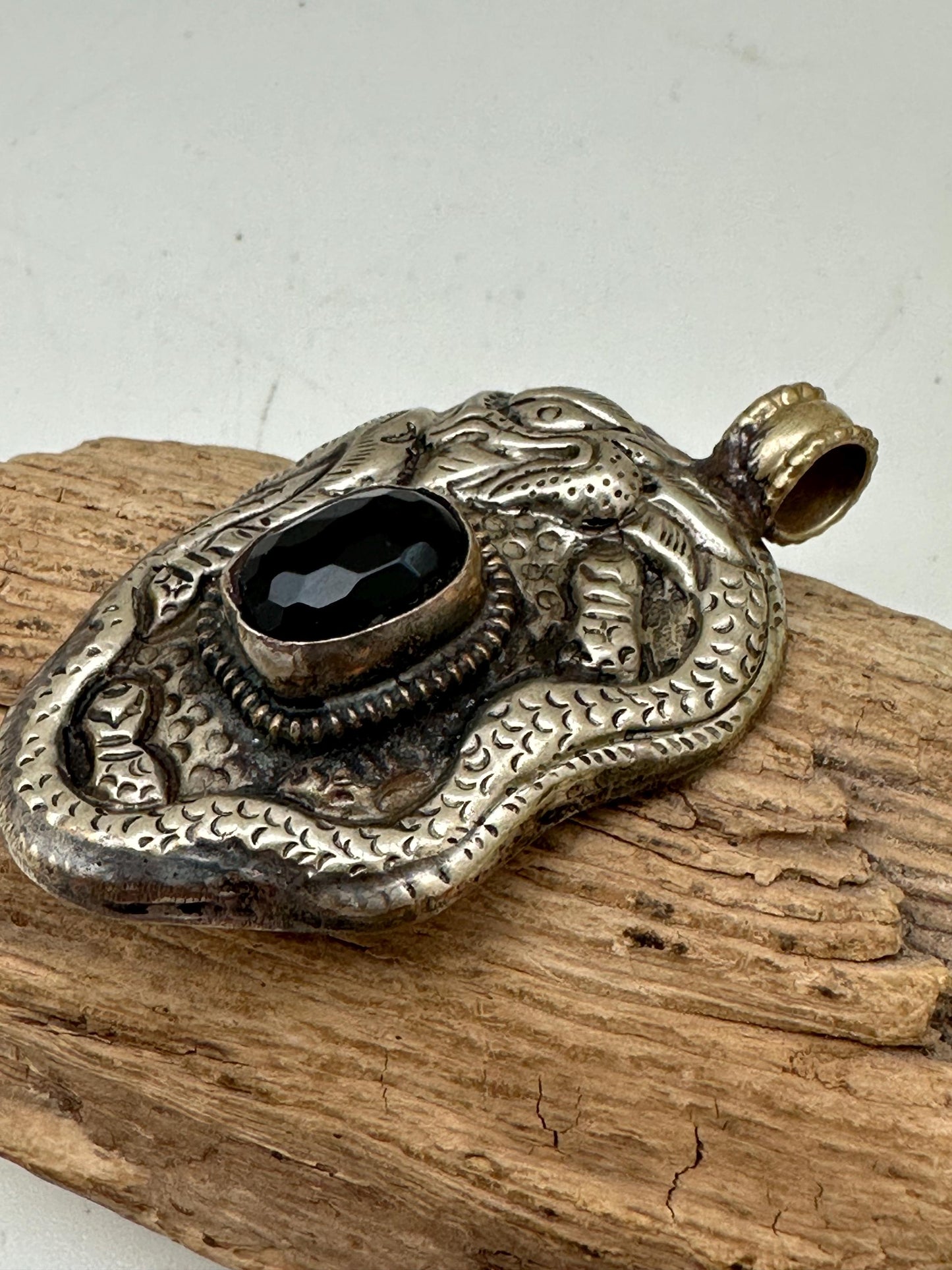 Dragon pendant, set with black onyx ,Tibetan repousse silver ,58mmX33mm