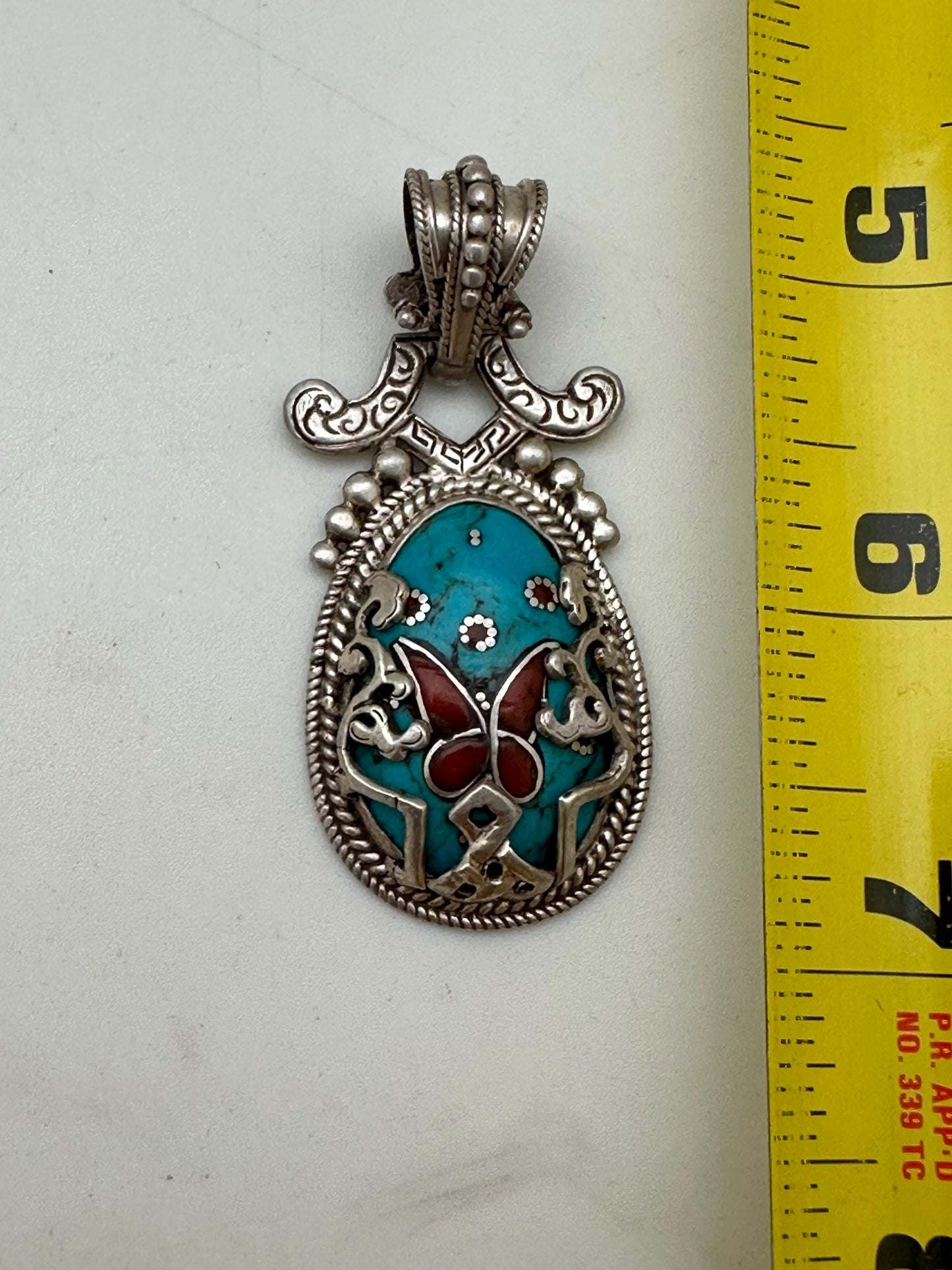 Tibetan turquoise butterfly pendant, coral inlay sterling silver, handcrafted, Tibetan design, Nepalese