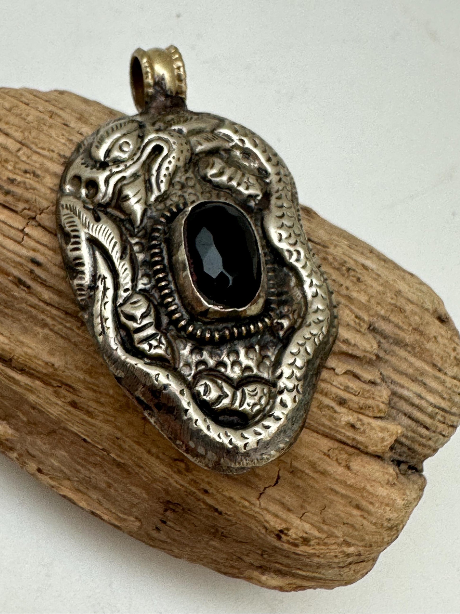 Dragon pendant, set with black onyx ,Tibetan repousse silver ,58mmX33mm