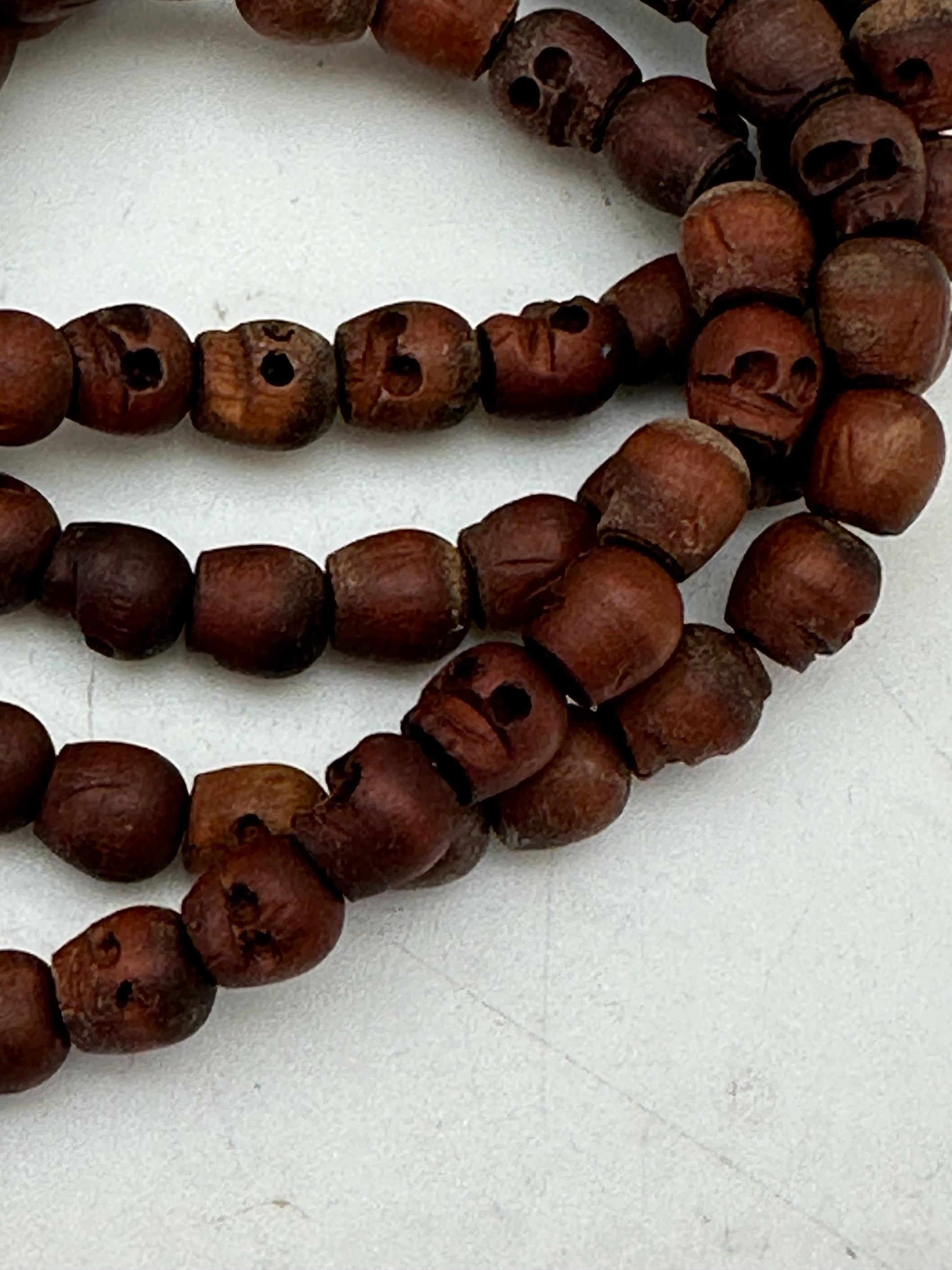 wooden skull mala, master handcrafted from nepal