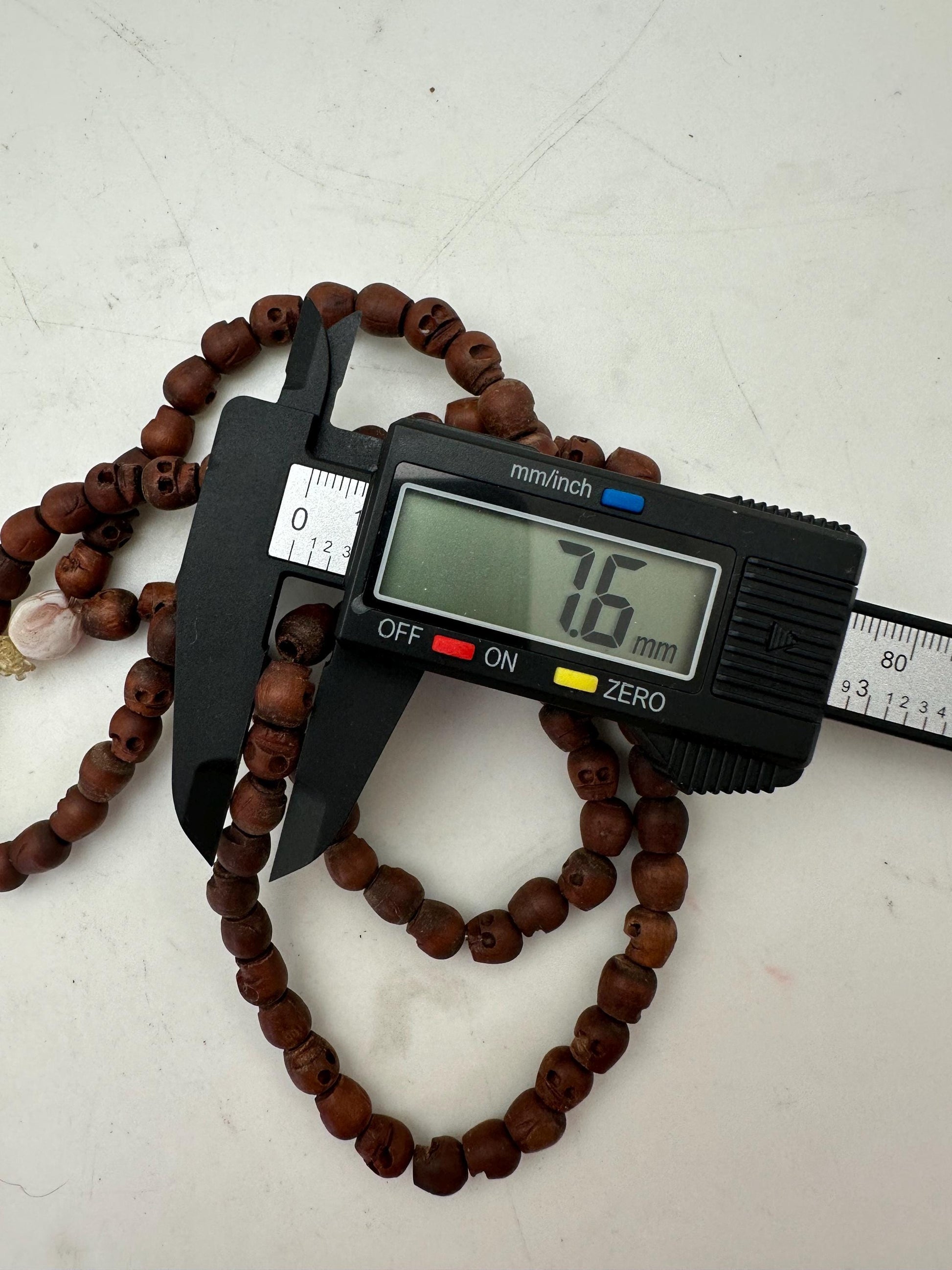 wooden skull mala, master handcrafted from nepal