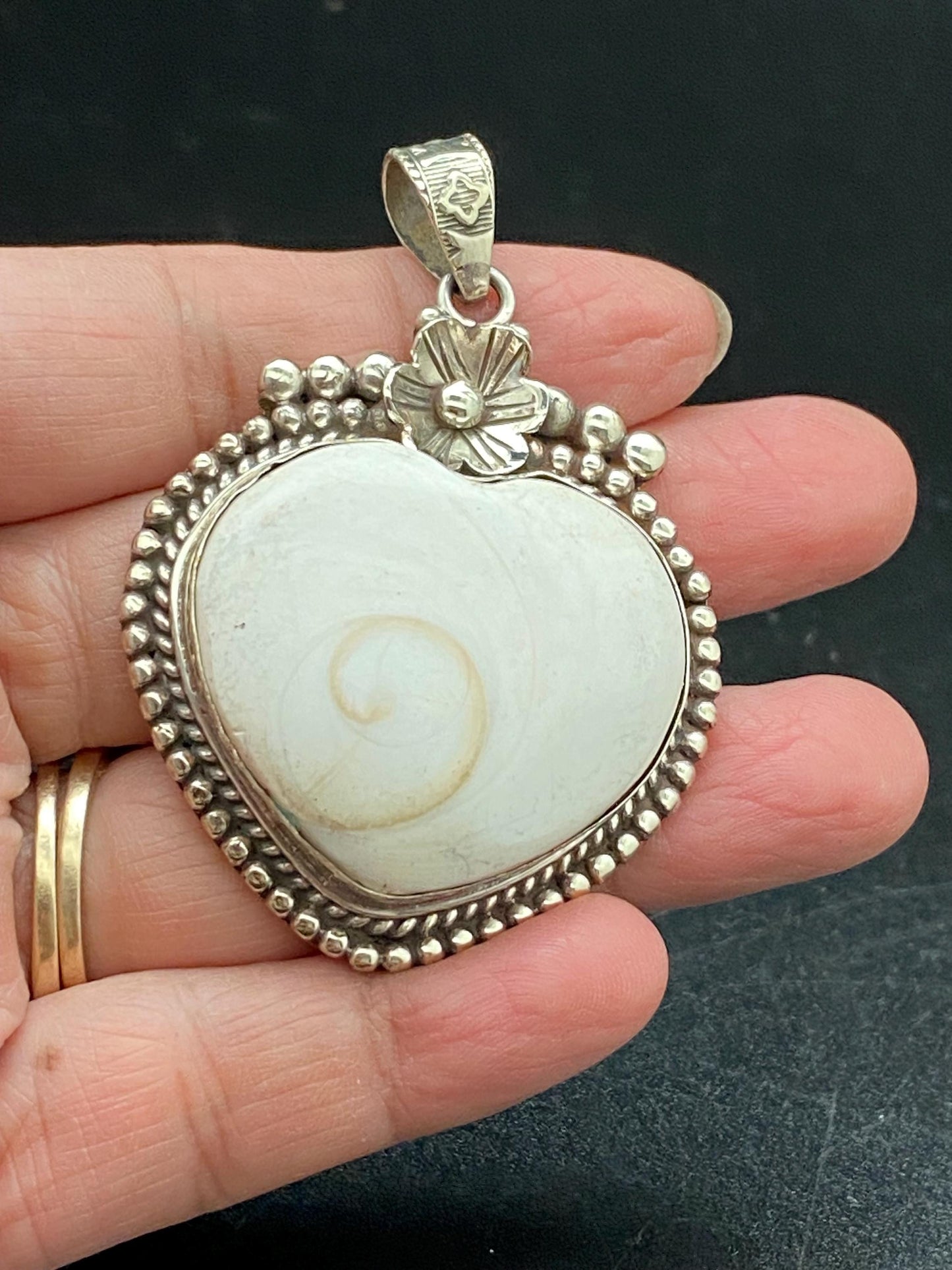 Handcrafted Shiva Shell Heart Pendant: Tibetan Silver Floral Design