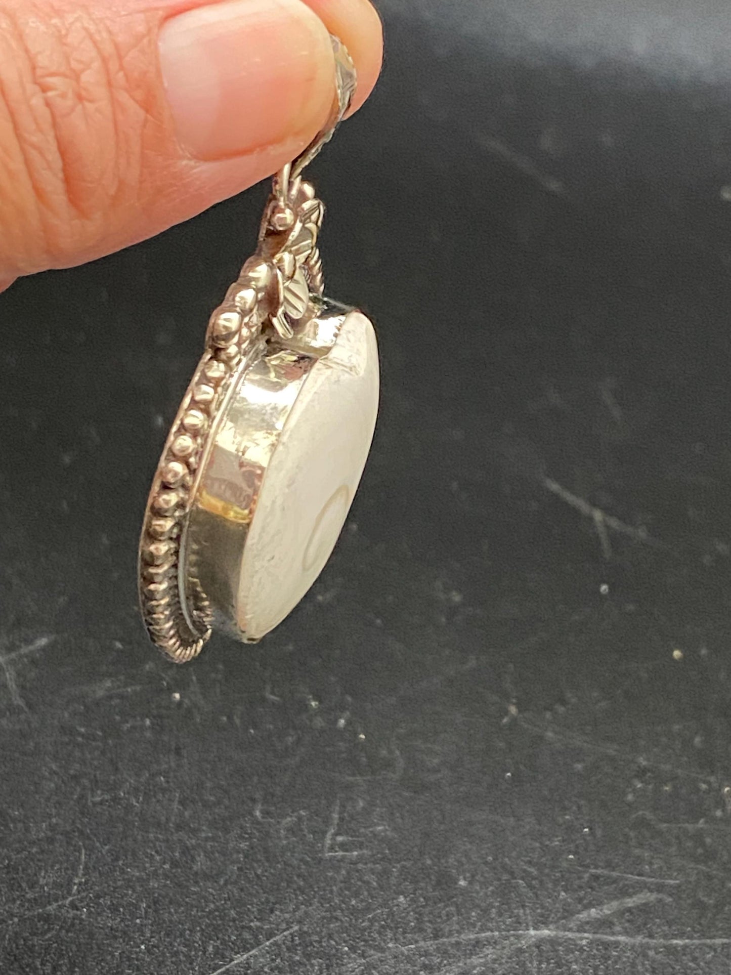 Handcrafted Shiva Shell Heart Pendant: Tibetan Silver Floral Design