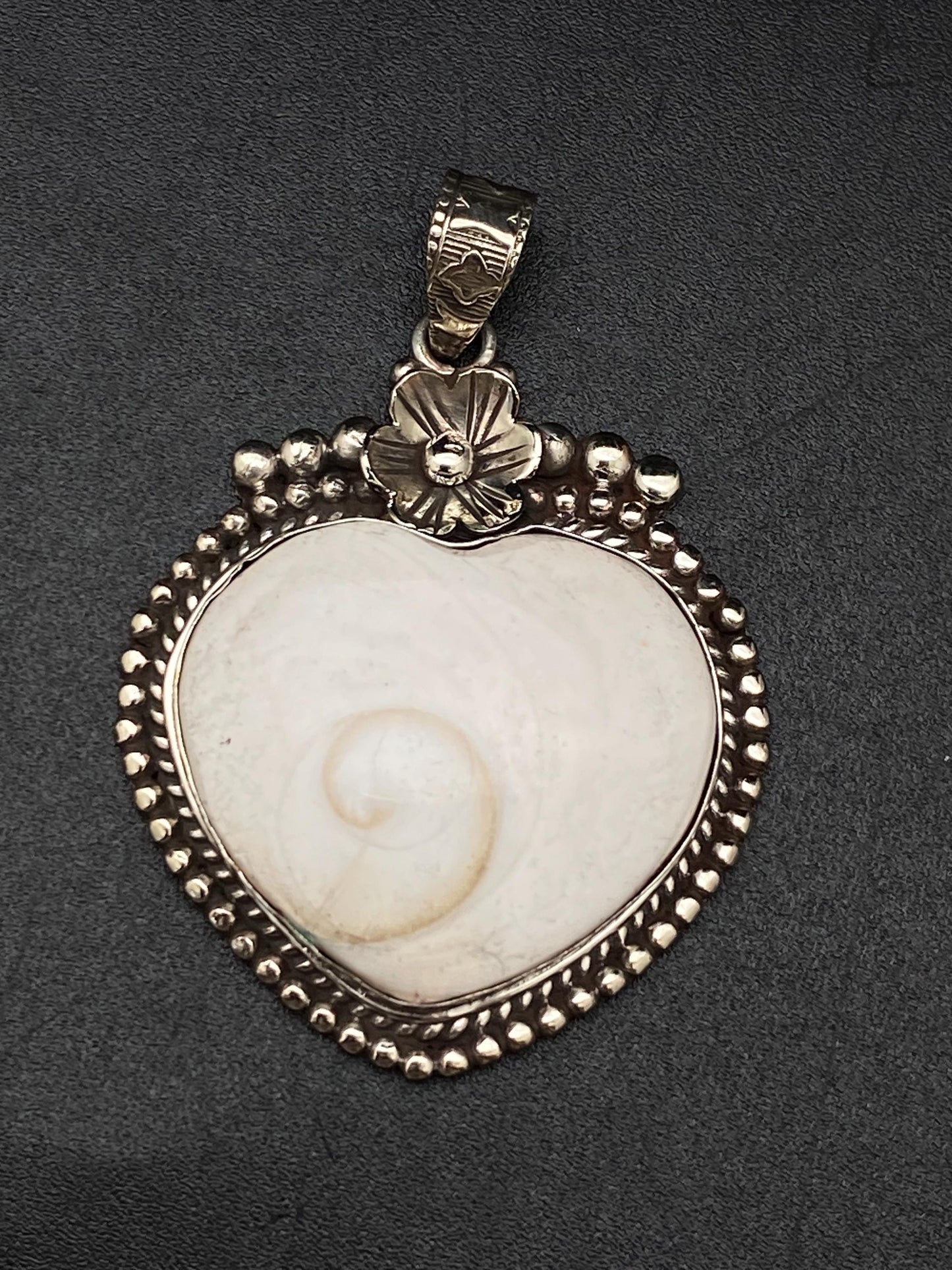 Handcrafted Shiva Shell Heart Pendant: Tibetan Silver Floral Design
