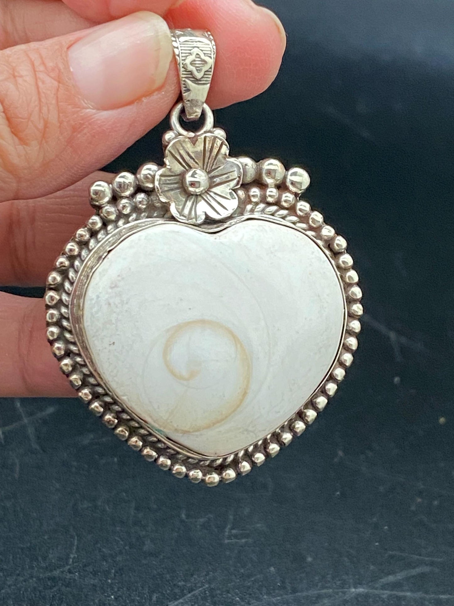 Handcrafted Shiva Shell Heart Pendant: Tibetan Silver Floral Design