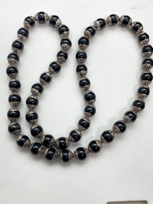 Handcrafted Black Onyx Mala Necklace: Tibetan Silver Capped Beads