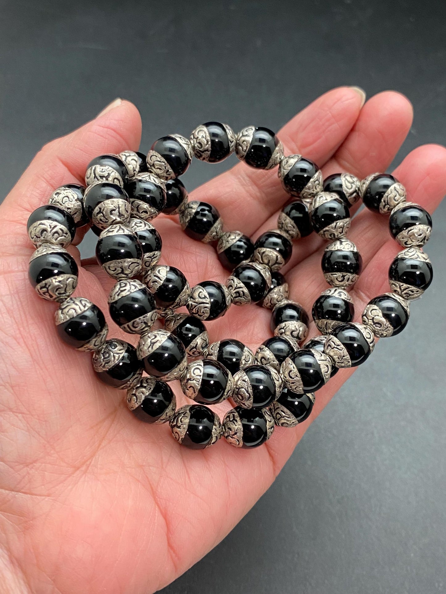 Handcrafted Black Onyx Mala Necklace: Tibetan Silver Capped Beads
