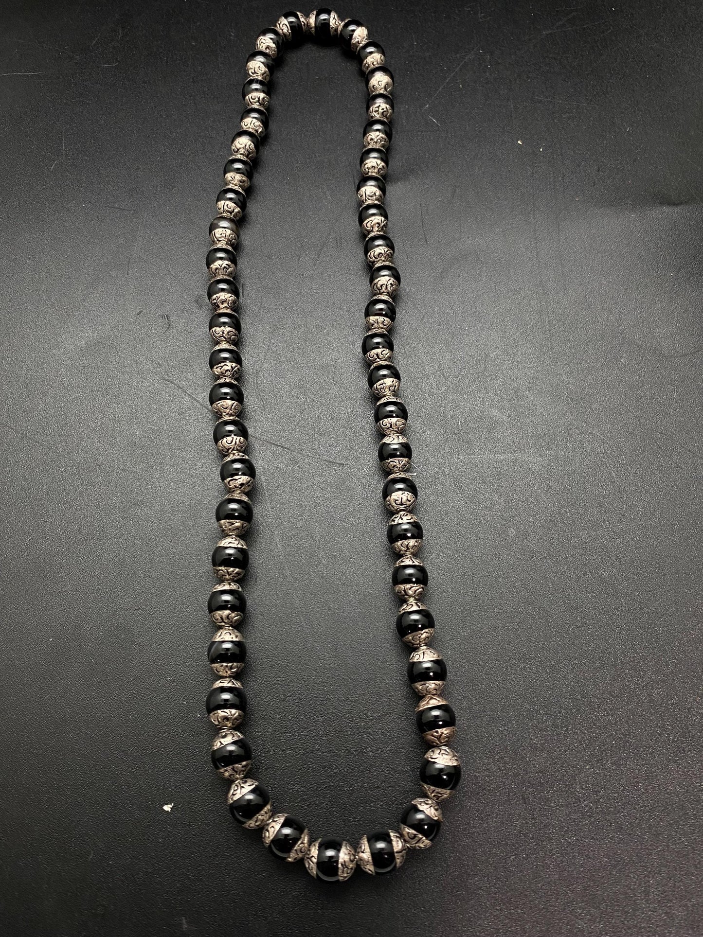 Handcrafted Black Onyx Mala Necklace: Tibetan Silver Capped Beads