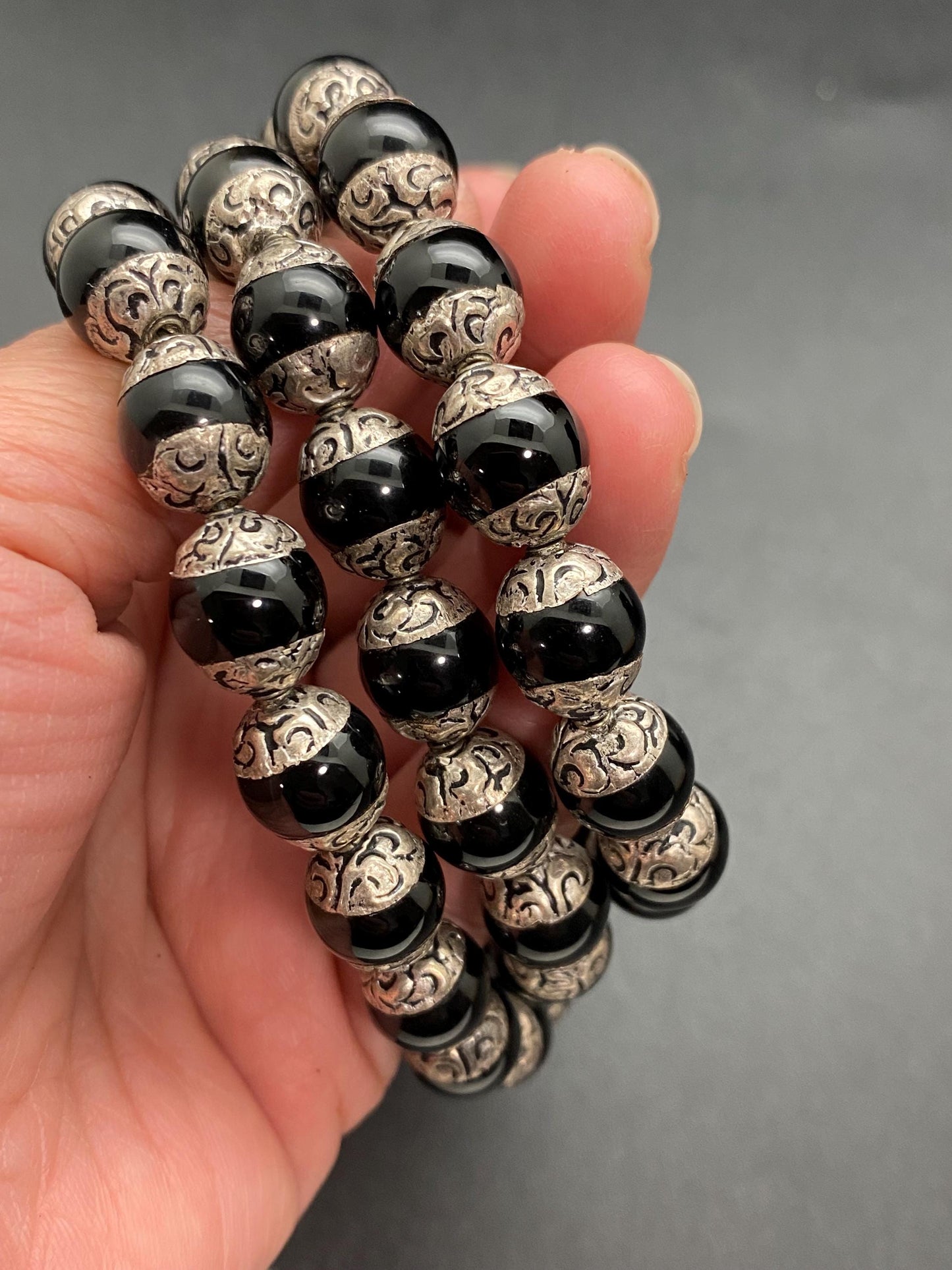 Handcrafted Black Onyx Mala Necklace: Tibetan Silver Capped Beads