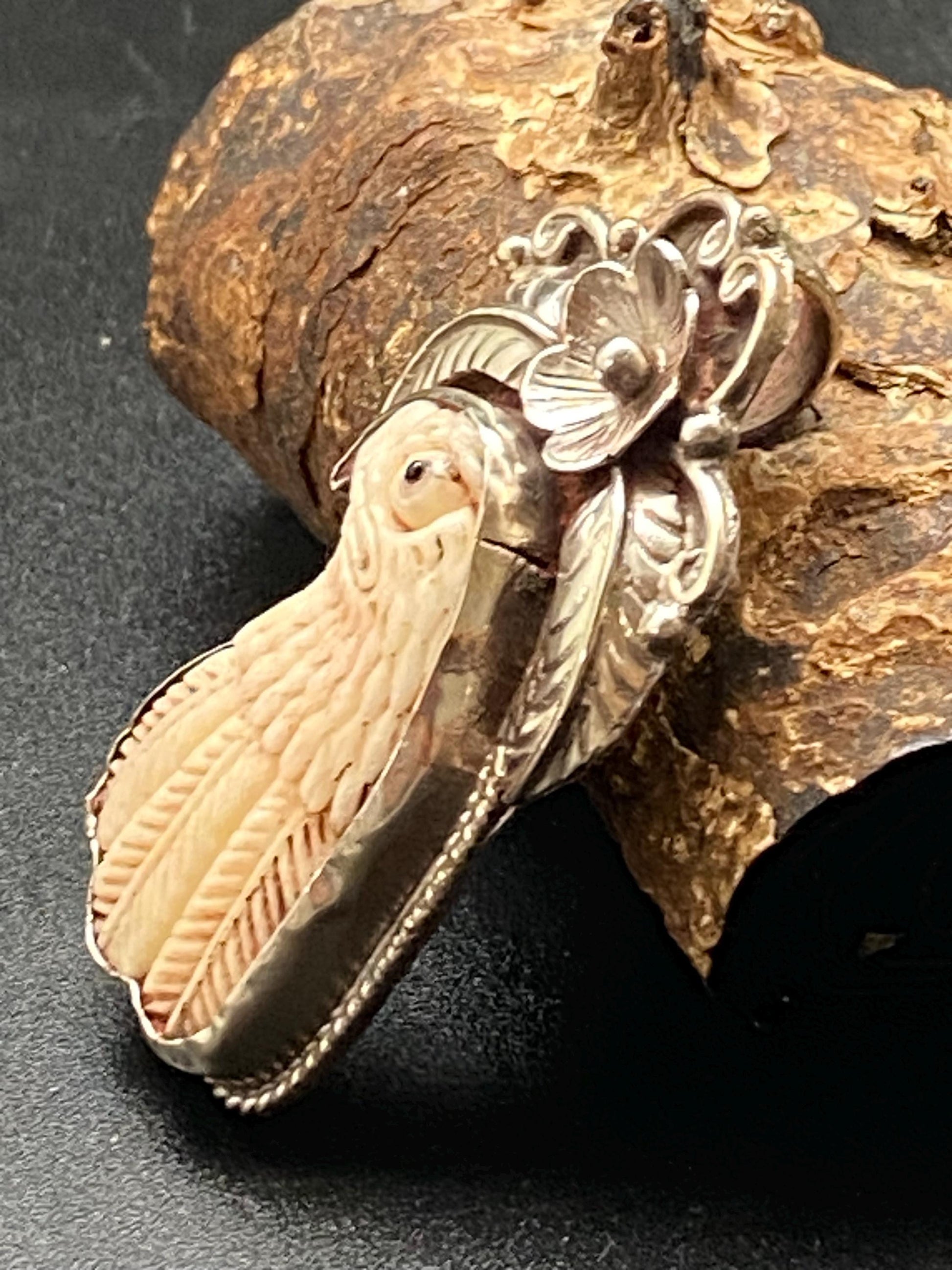 eagle pendant, bird pendant, bone carved pendant, handcrafted, Tibetan silver, Nepalese, Himalayan, floral pendant