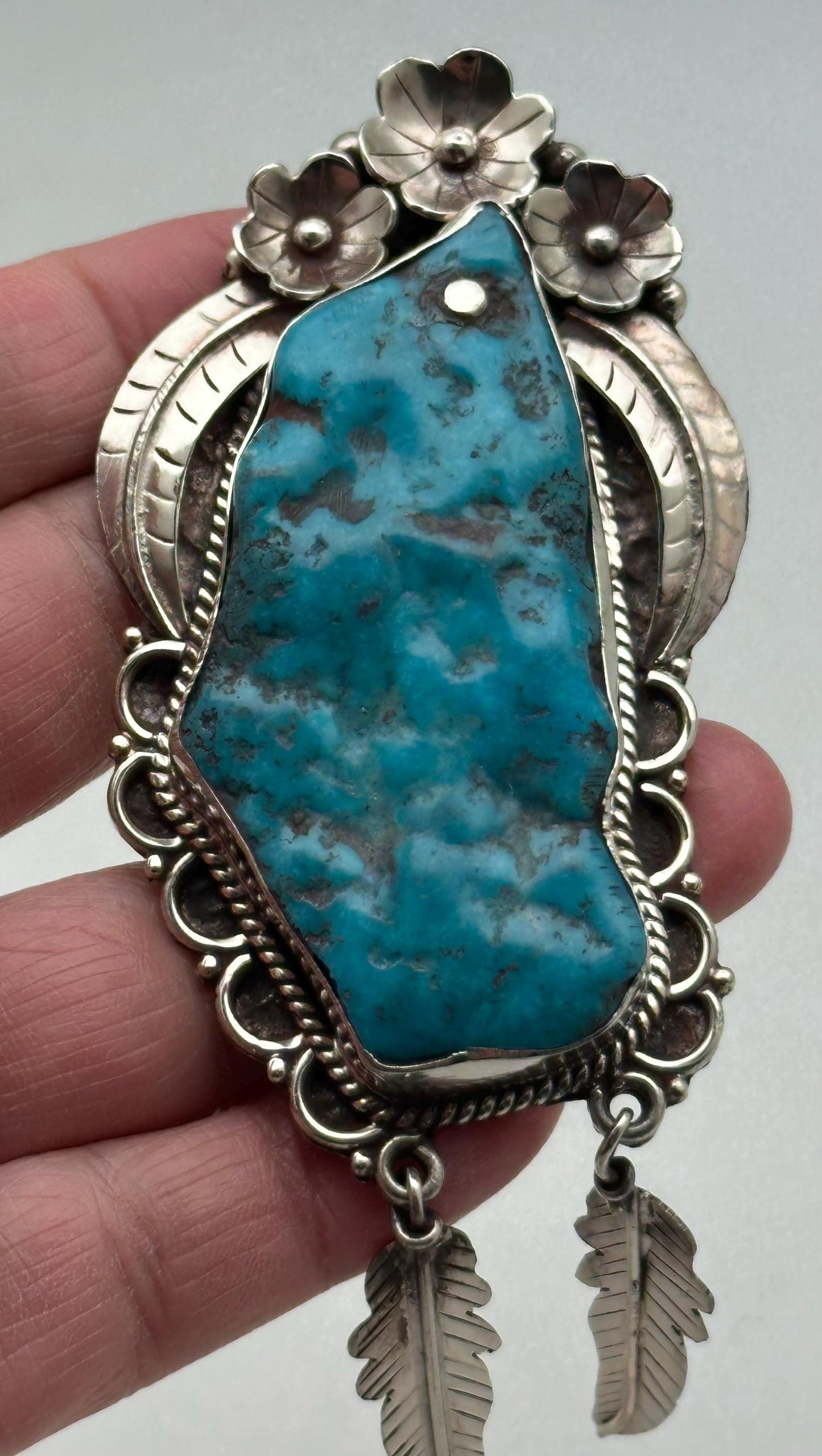 Handcrafted Turquoise Tibetan Silver Pendant: Ethnic Floral Dangle