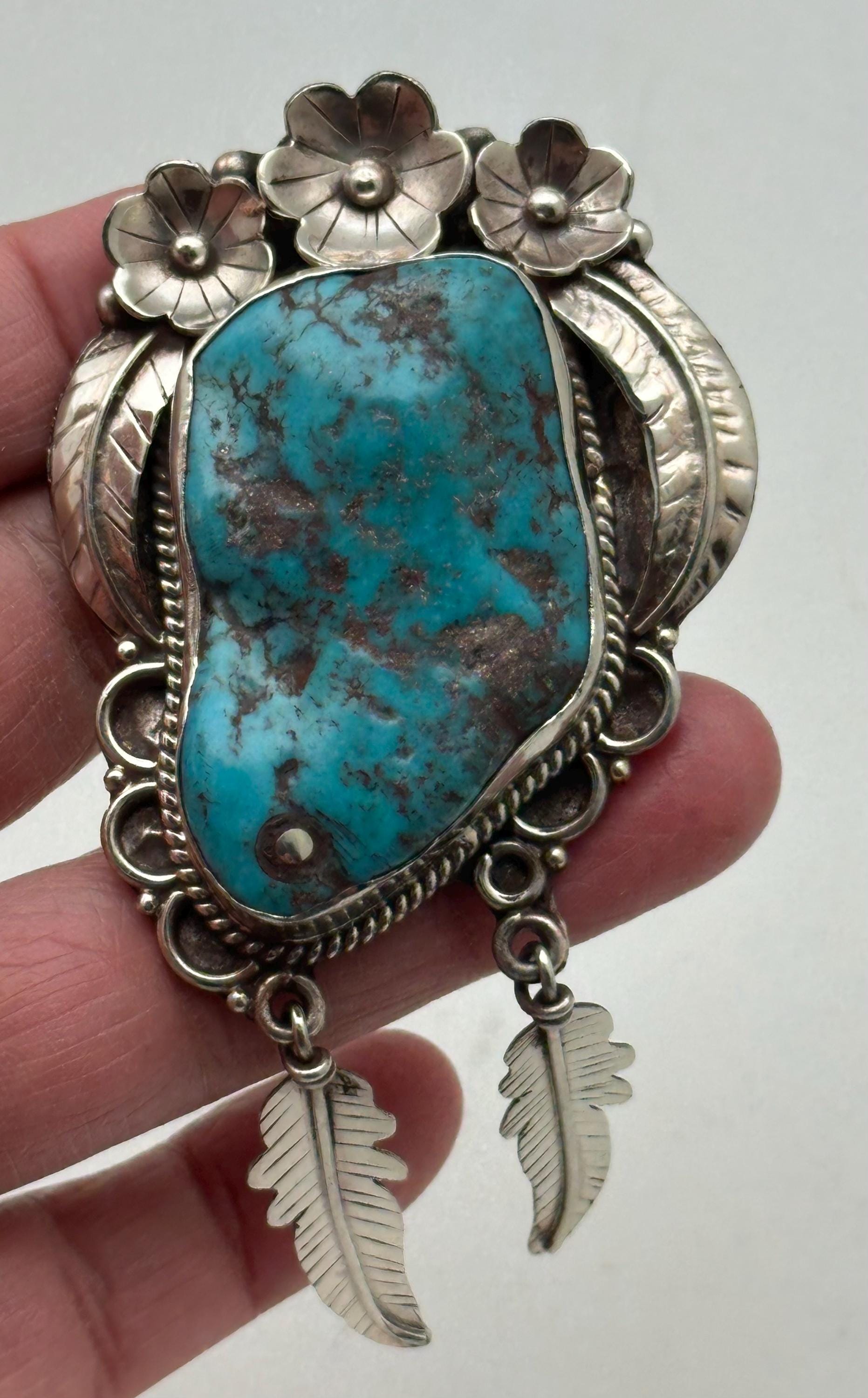Handcrafted Turquoise Tibetan Silver Pendant: Ethnic Floral Dangle