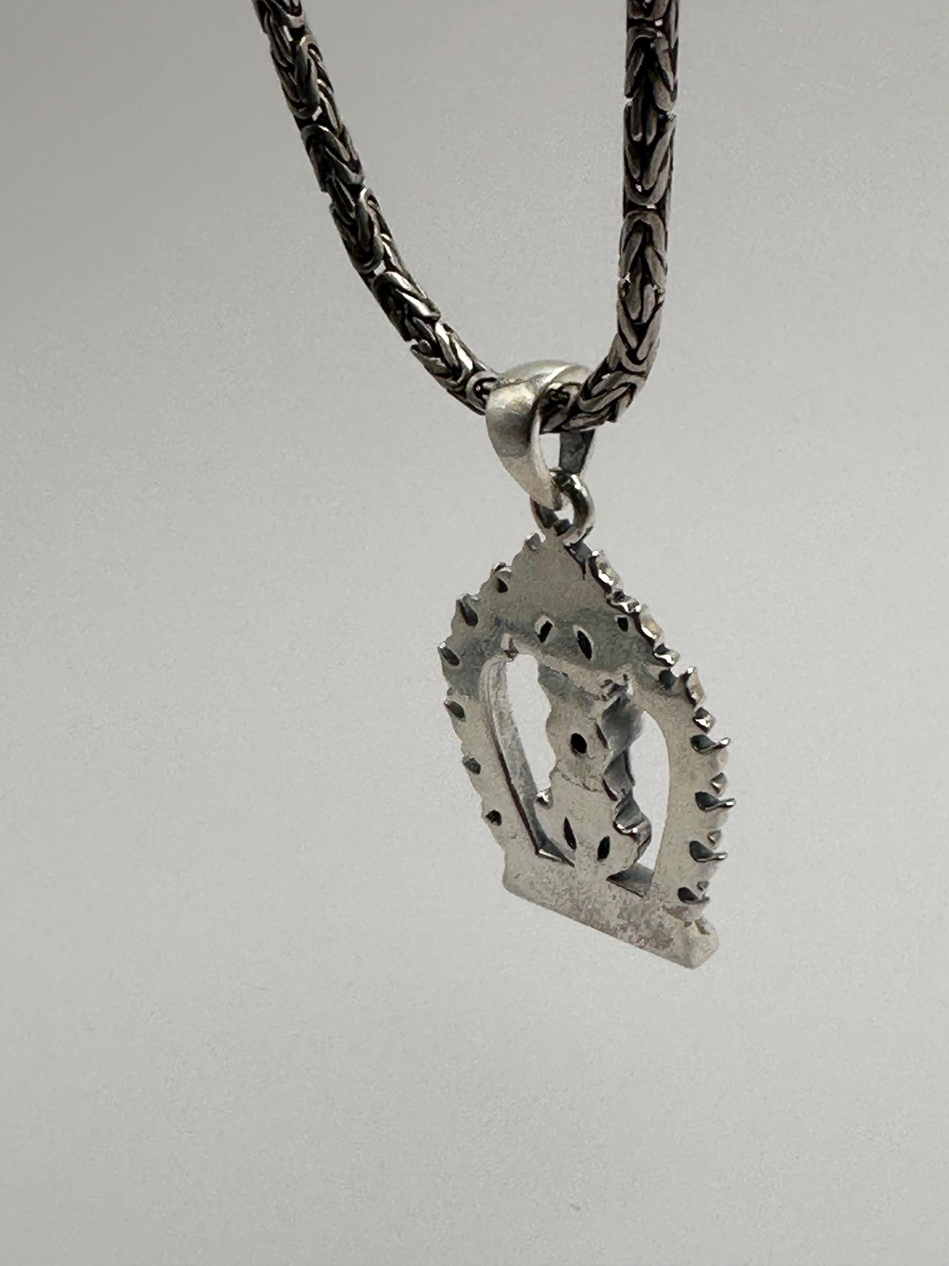 Sterling Silver Vajra Pendant: Black Onyx Dorje Flame Design