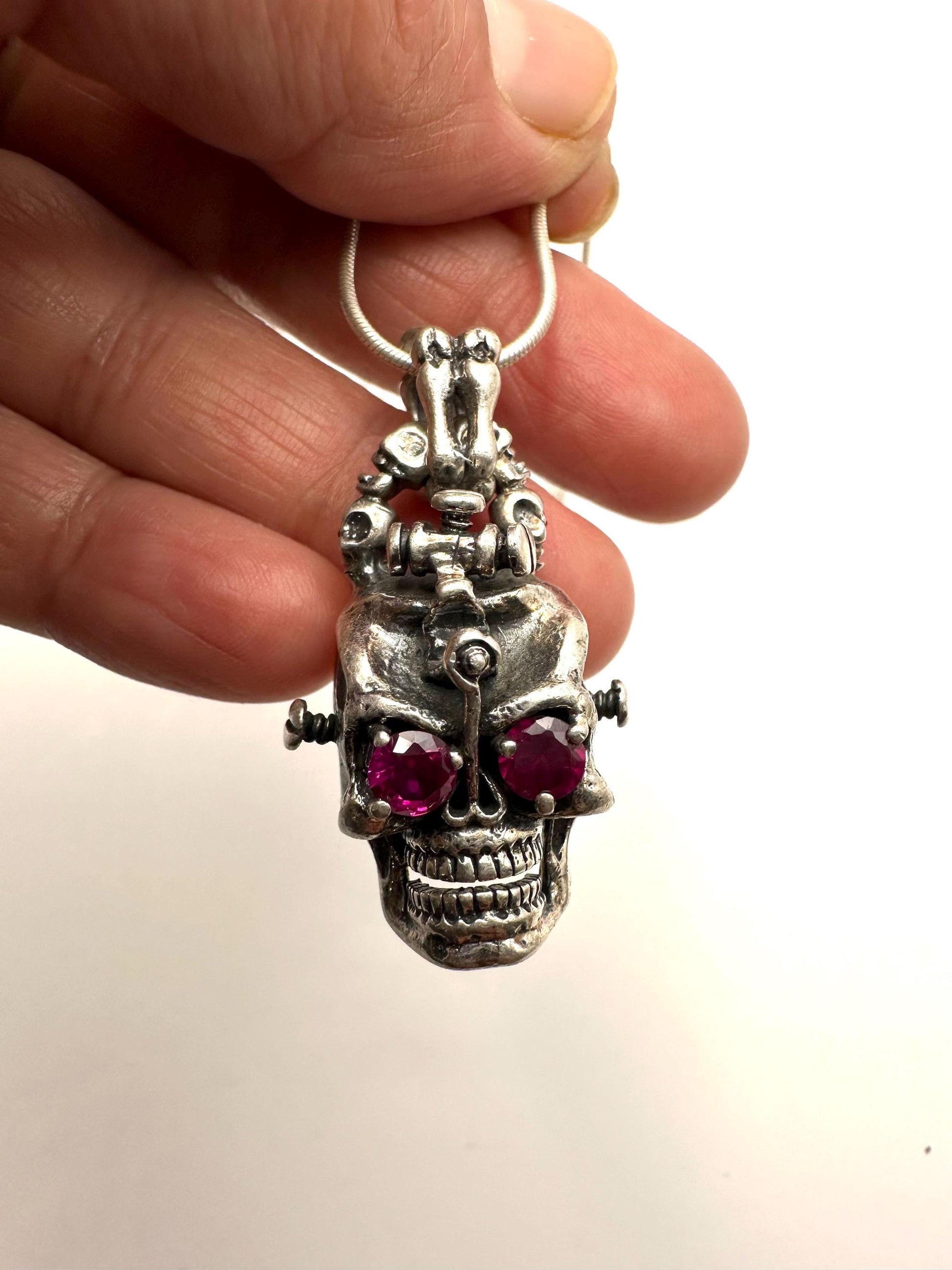 Sterling Silver Skull Pendant with Red Gems: Gothic Biker Jewelry