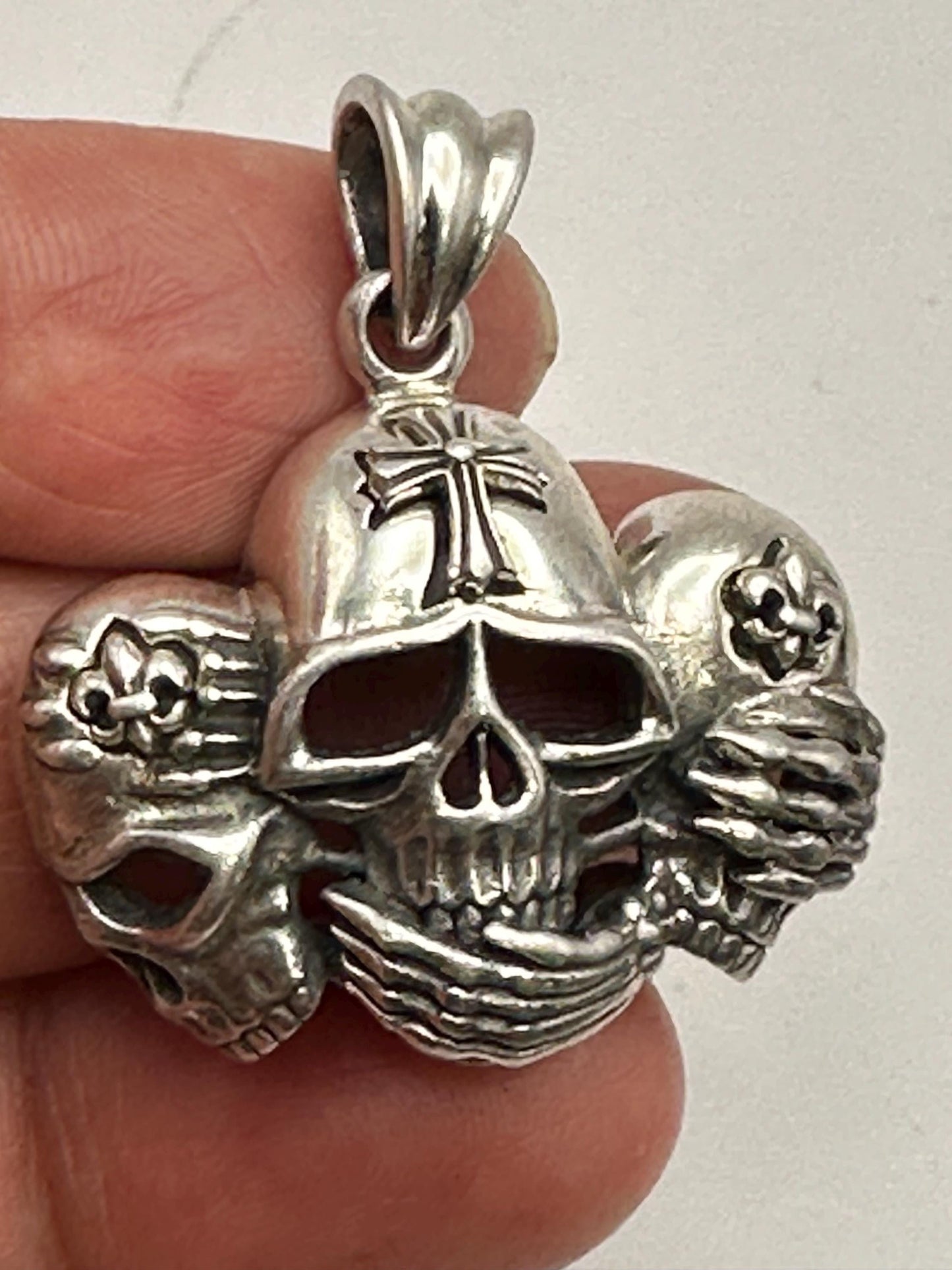 solid silver,three skull pendant,cross pendant ,sterling silver, do not see bad,do not listen bad,do not speak bad,symbol of power