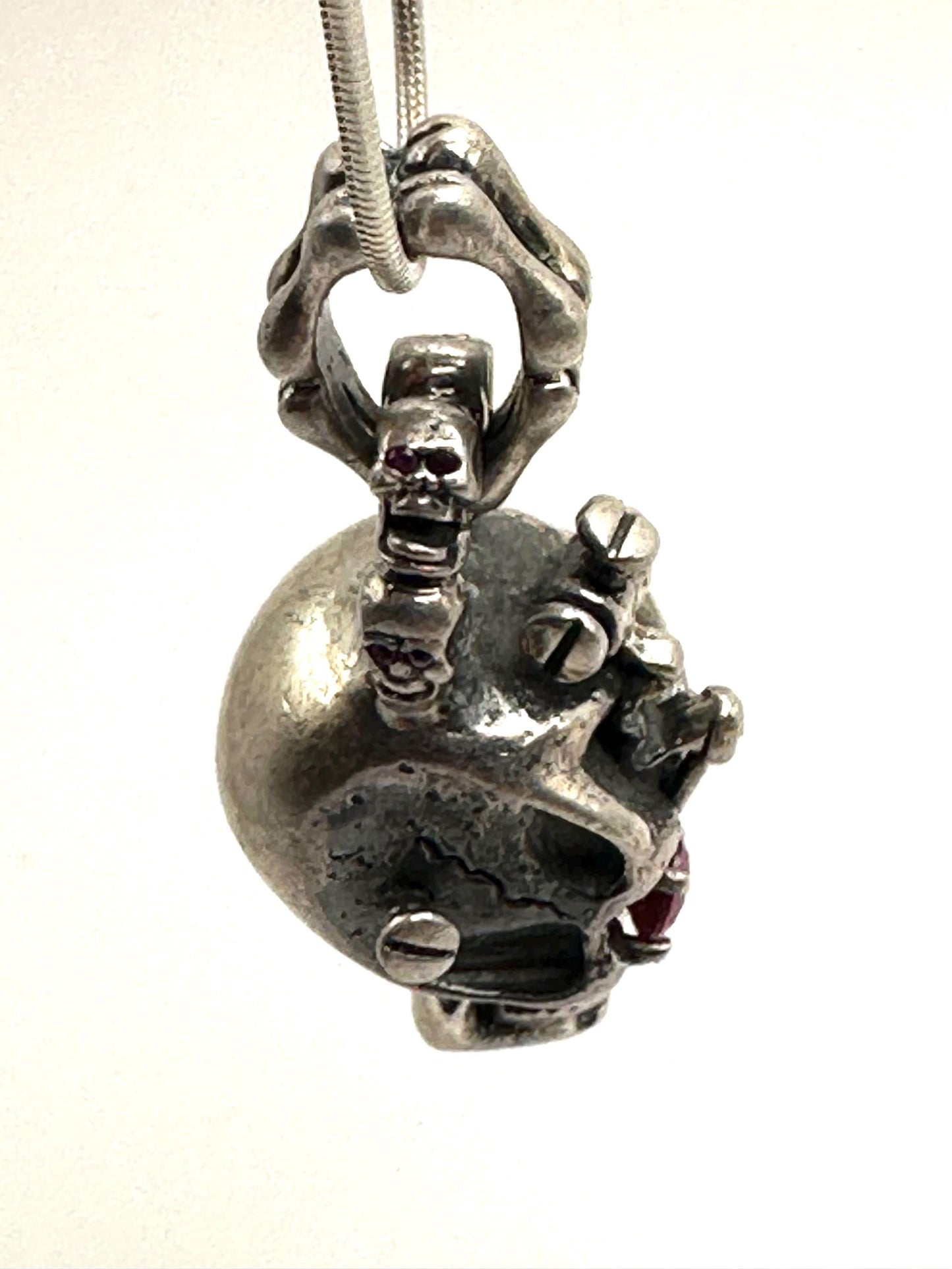 Sterling Silver Skull Pendant with Red Gems: Gothic Biker Jewelry