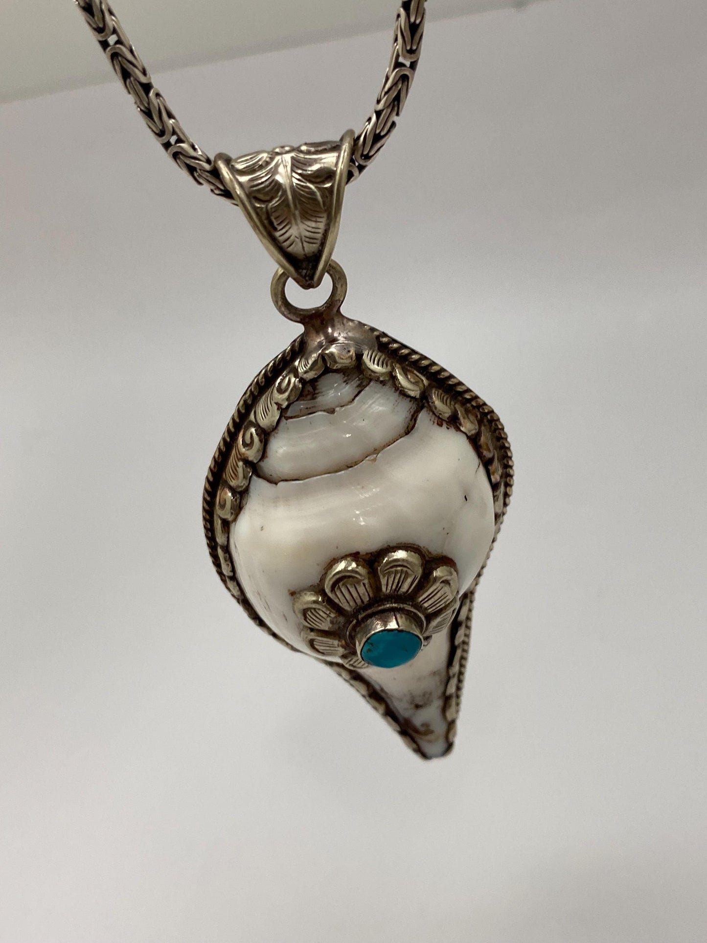 Conch shell pendant, handcrafted, turquoise, Tibetan silver, Nepalese