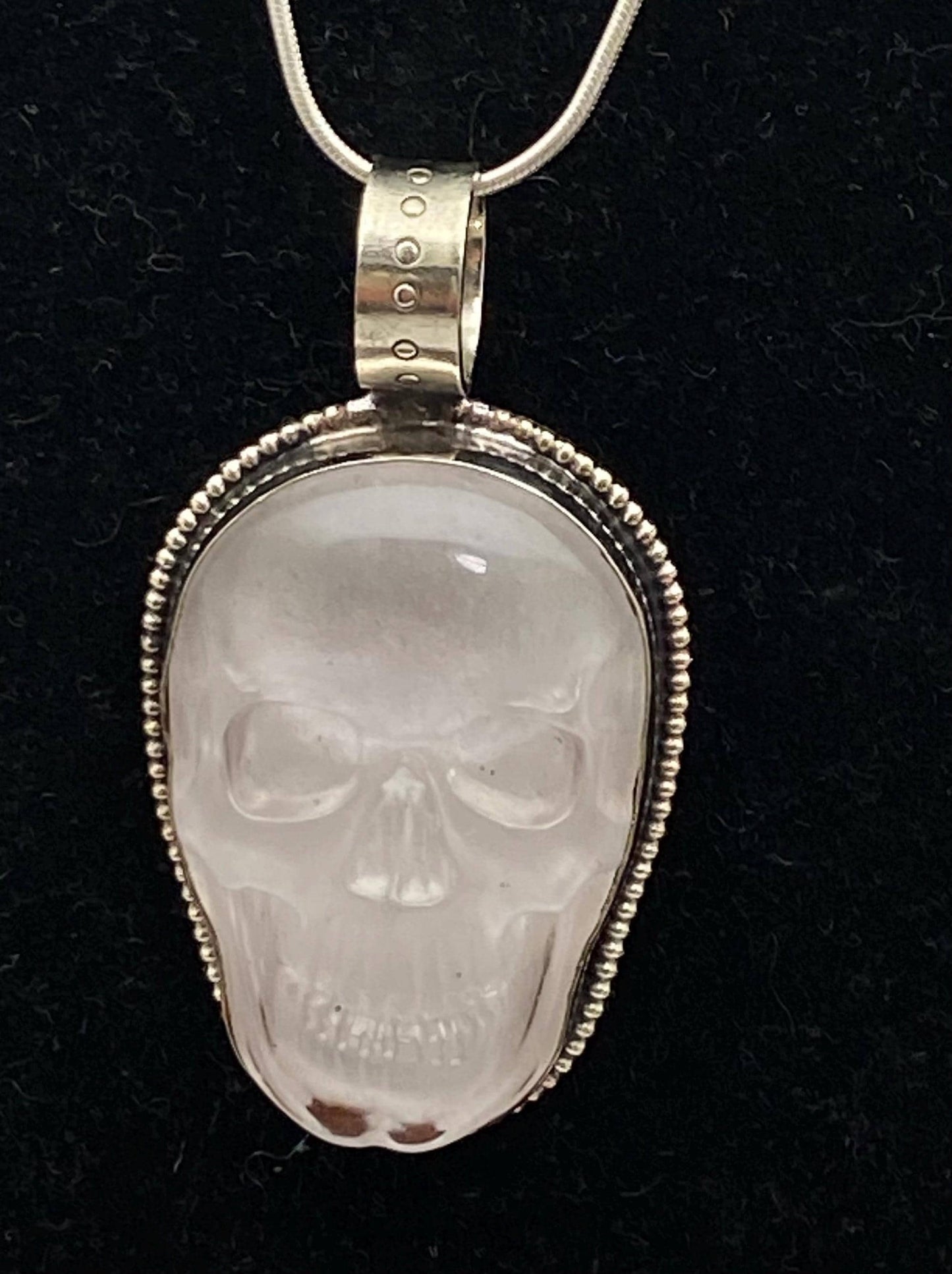 Quartz crystal carved skull pendant, handcrafted, Tibetan silver, Nepalese