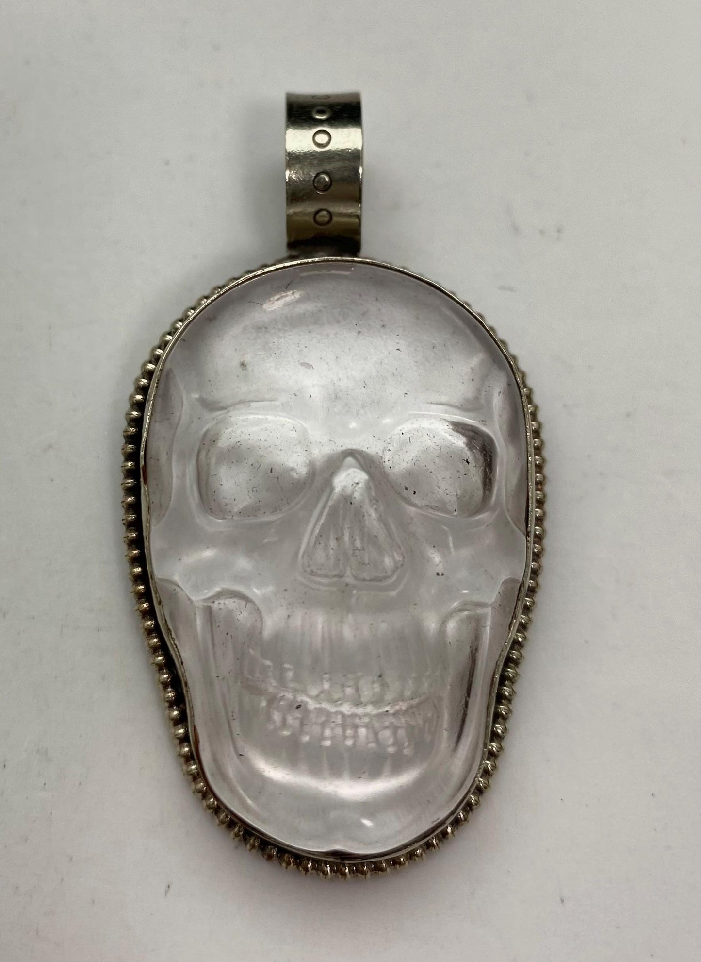 Quartz crystal carved skull pendant, handcrafted, Tibetan silver, Nepalese
