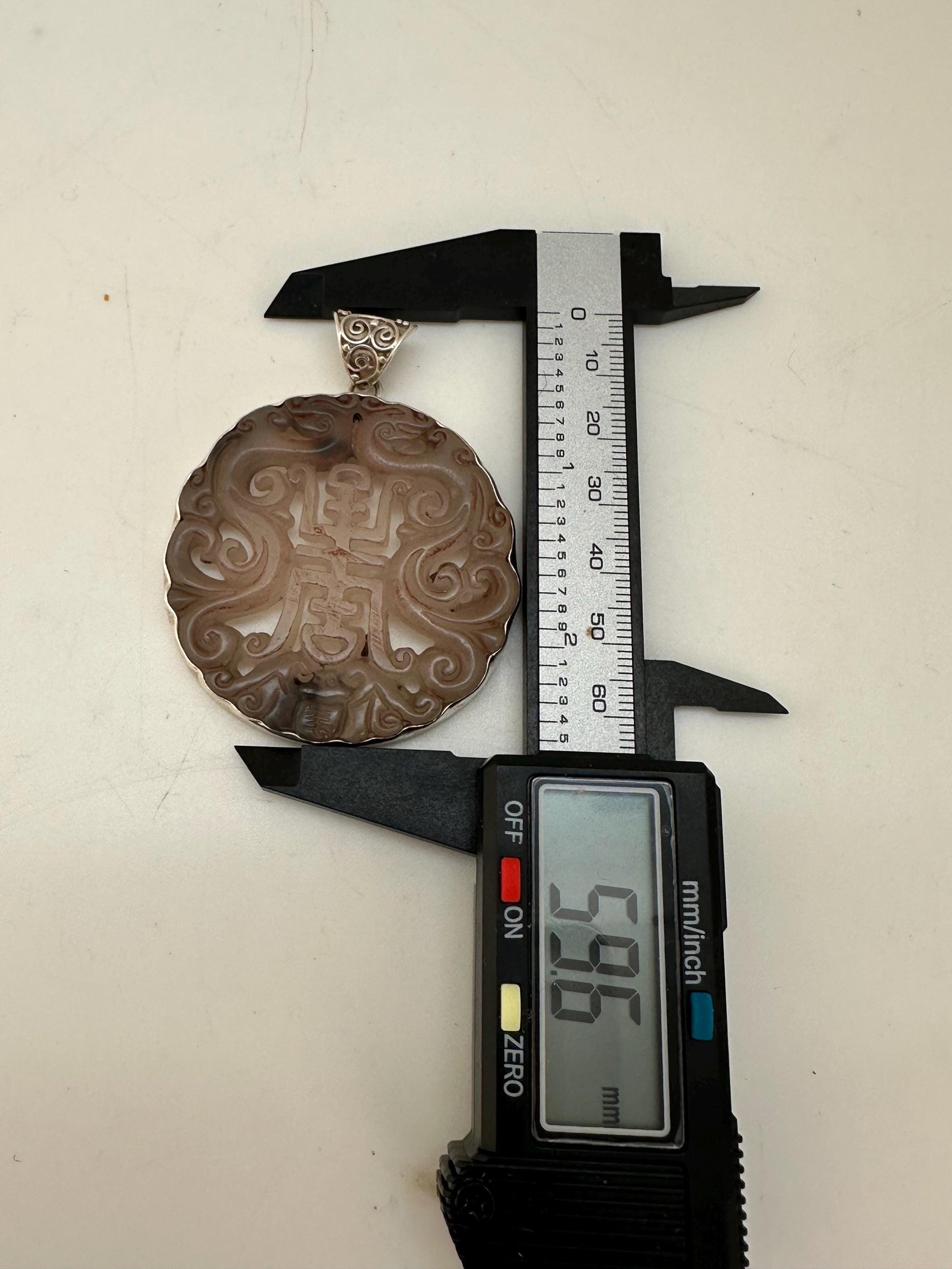 Jade pendant,handcrafted, 925 silver,sterling silver with bail 44.7mmX59.6mm with bail weighs about 35gm