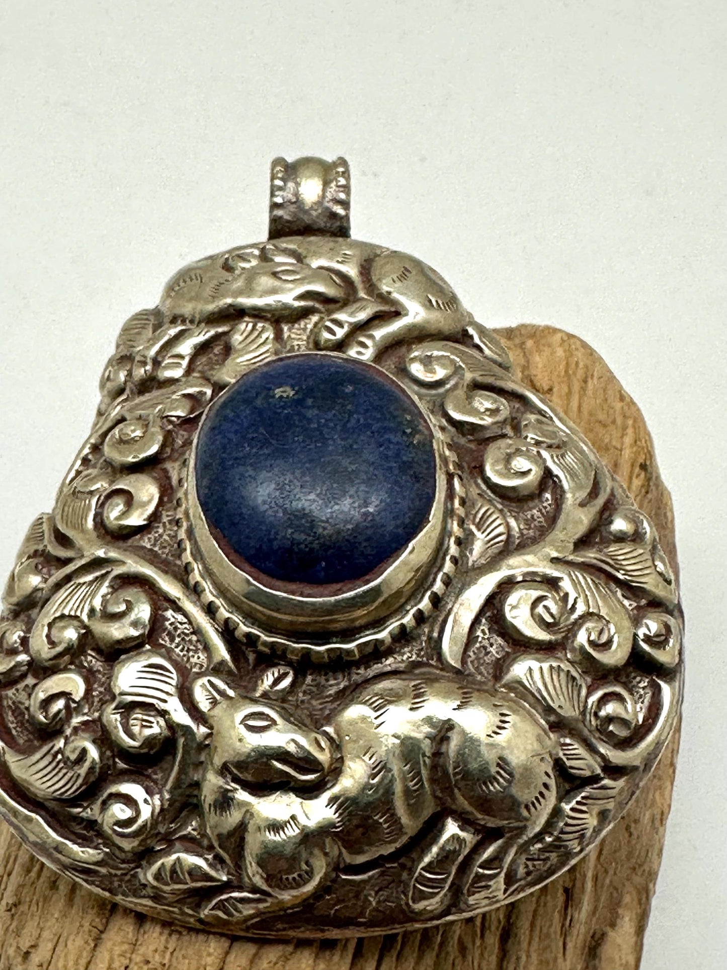 Lapis Lazuli Pendant, Handcrafted Tibetan Repoussé Silver, Animal Motif Jewelry