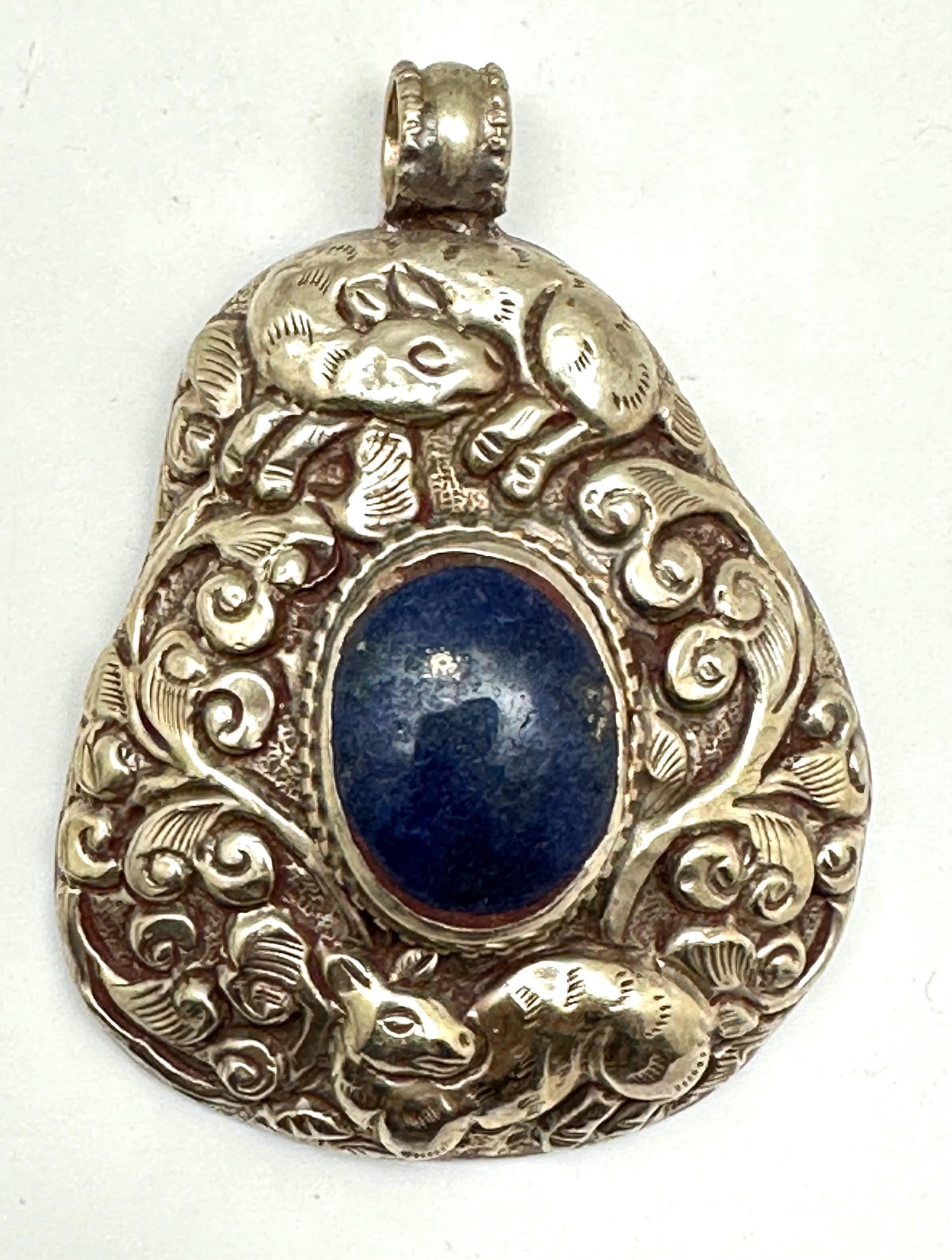 Lapis Lazuli Pendant, Handcrafted Tibetan Repoussé Silver, Animal Motif Jewelry