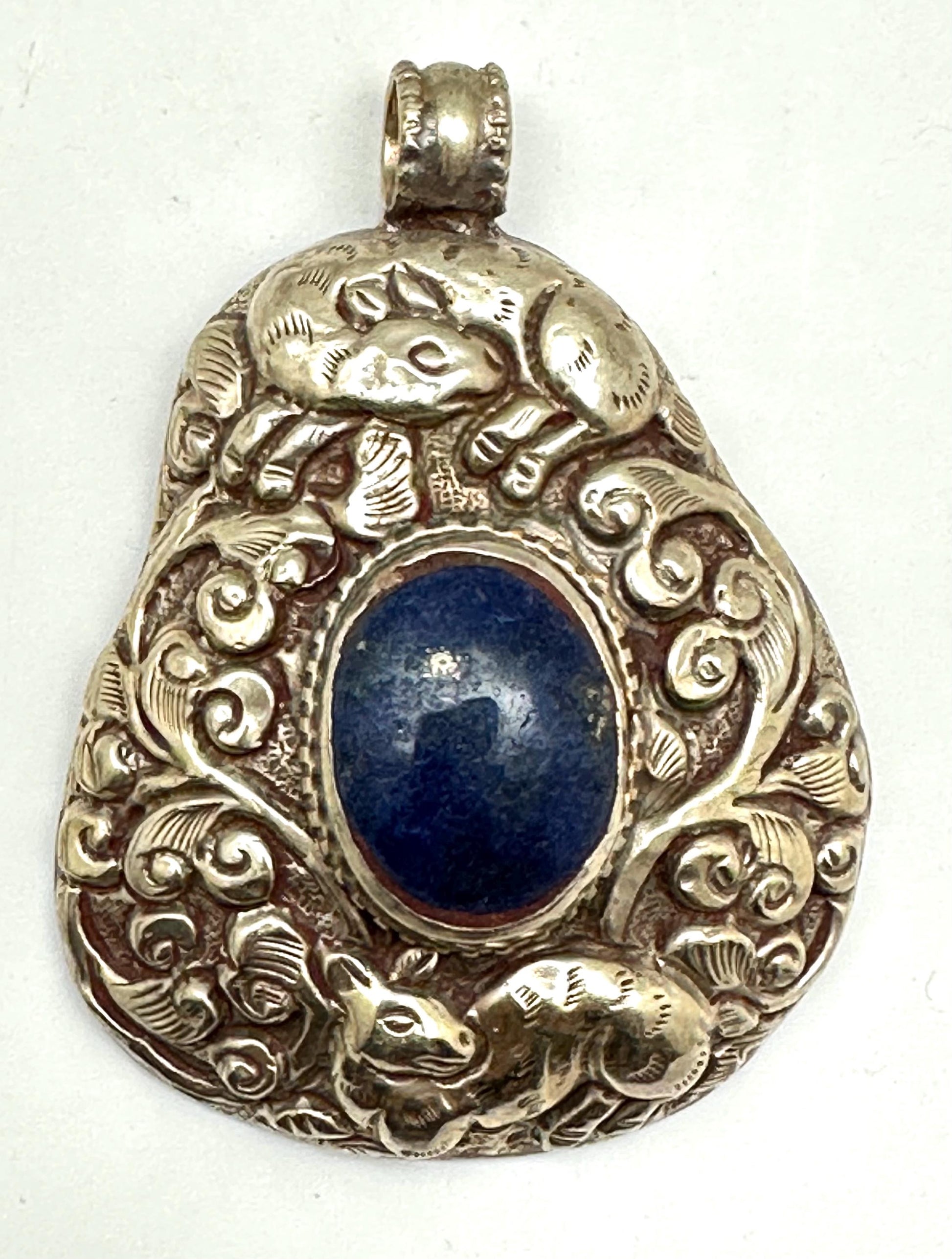 Lapis Lazuli Pendant, Handcrafted Tibetan Repoussé Silver, Animal Motif Jewelry
