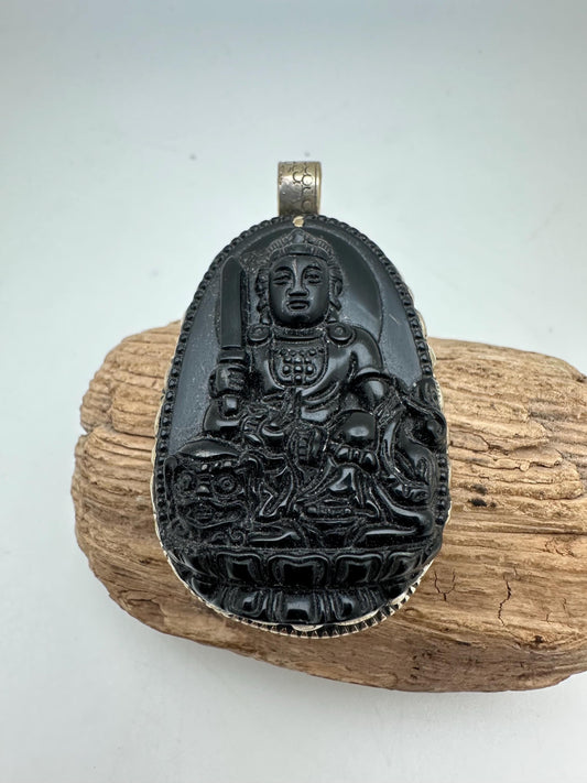 Obsidian manjusri, handcrafted with Tibetan silver