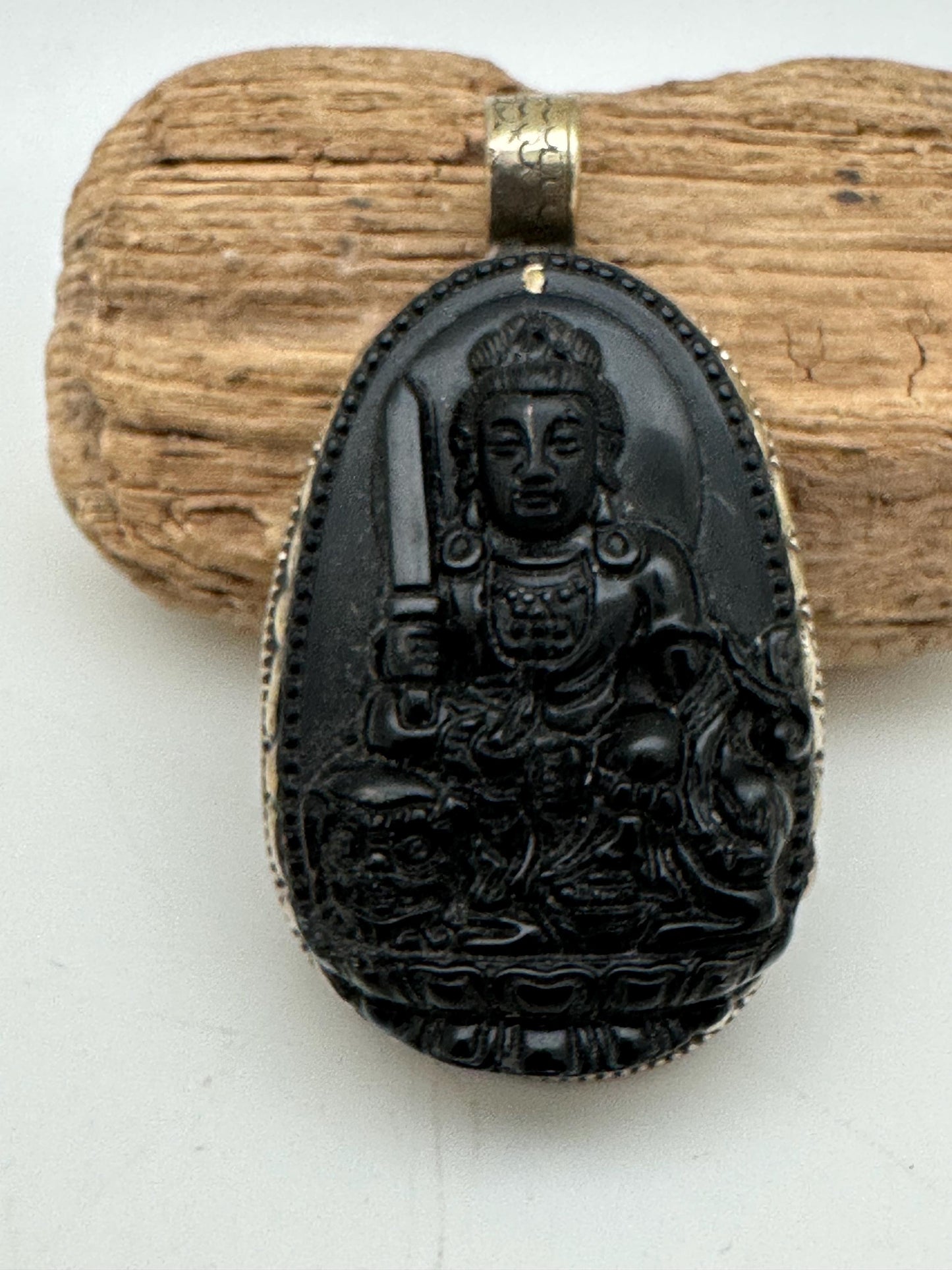 Obsidian manjusri, handcrafted with Tibetan silver