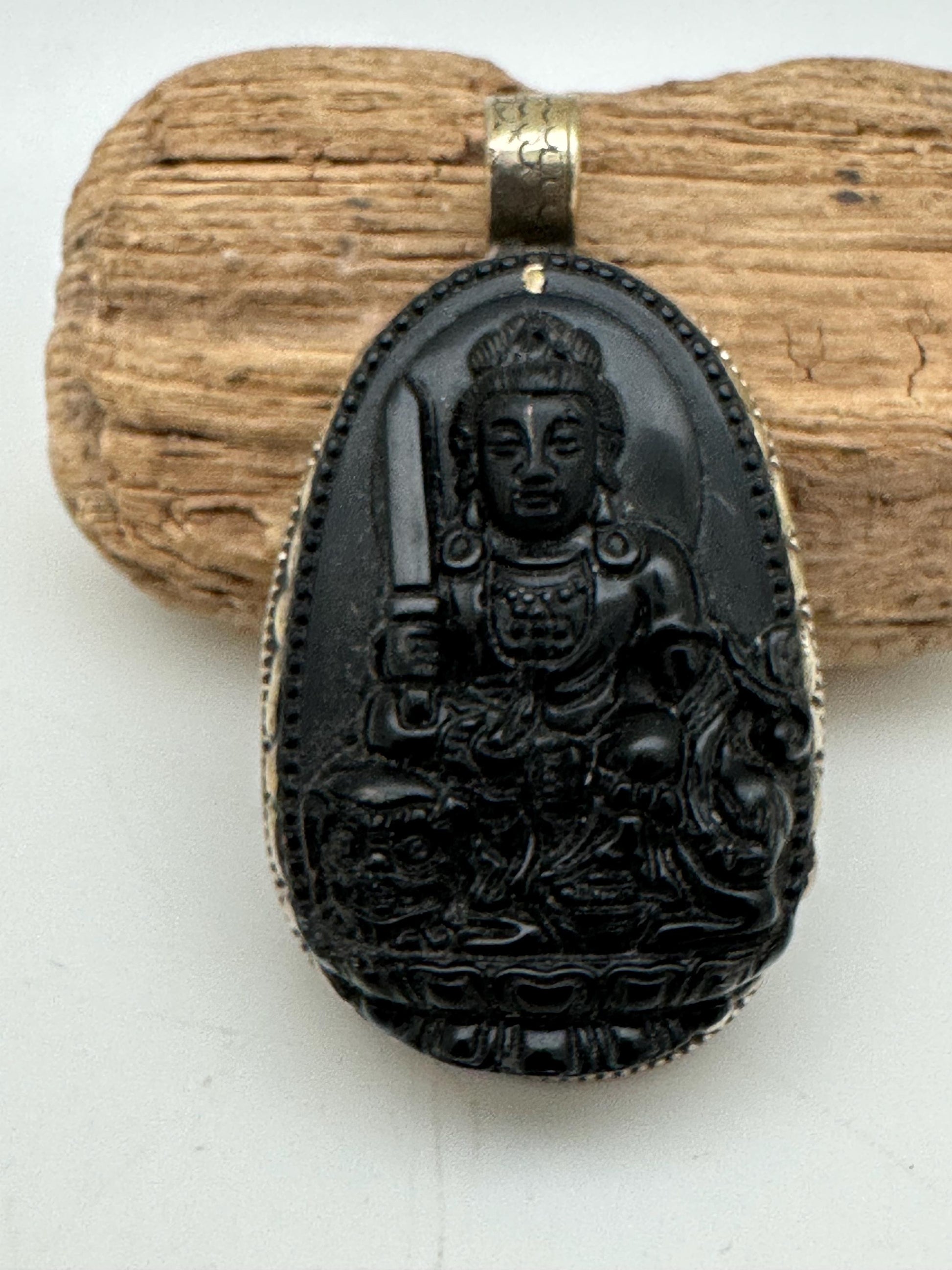 Obsidian manjusri, handcrafted with Tibetan silver