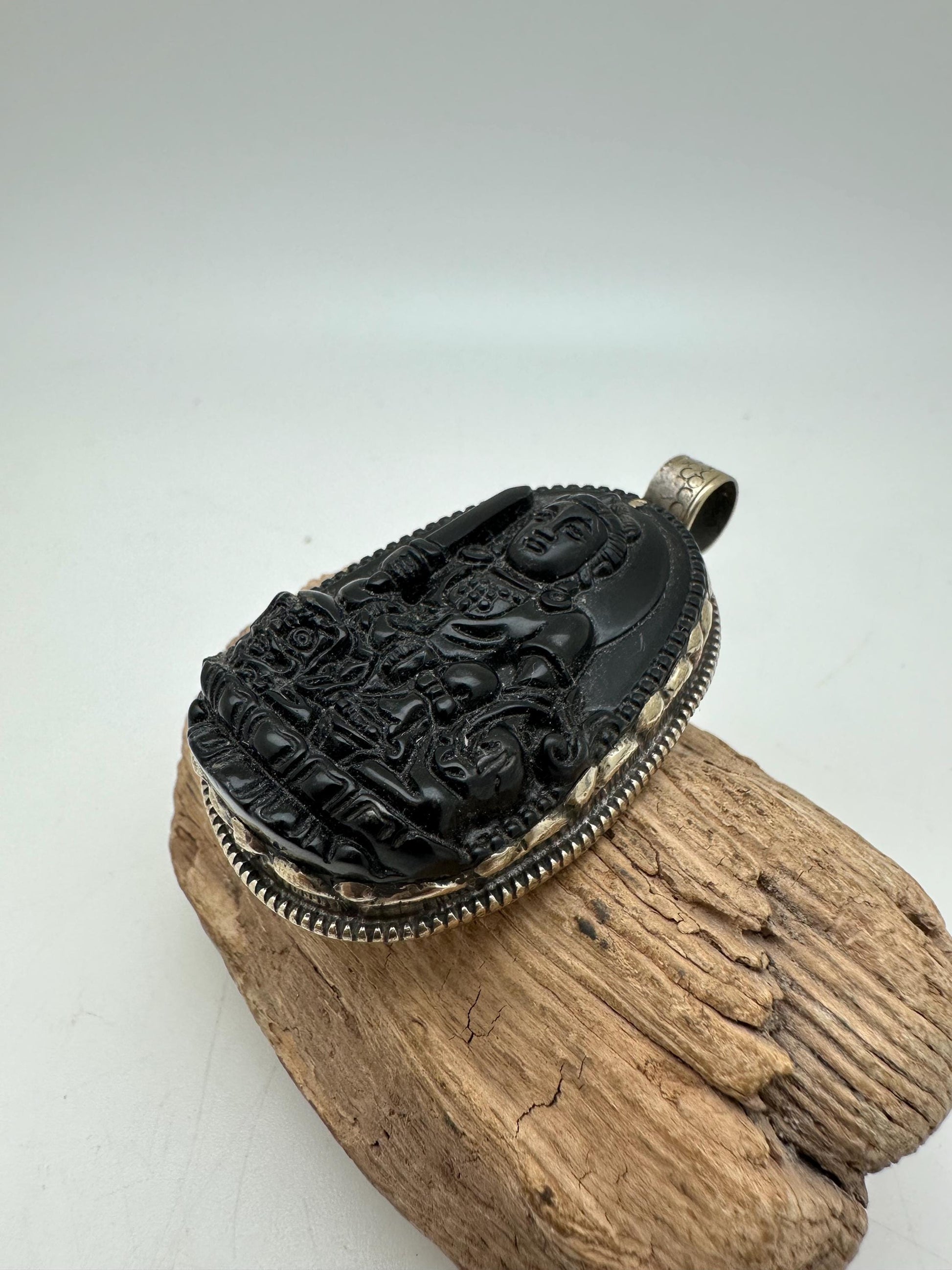 Obsidian manjusri, handcrafted with Tibetan silver