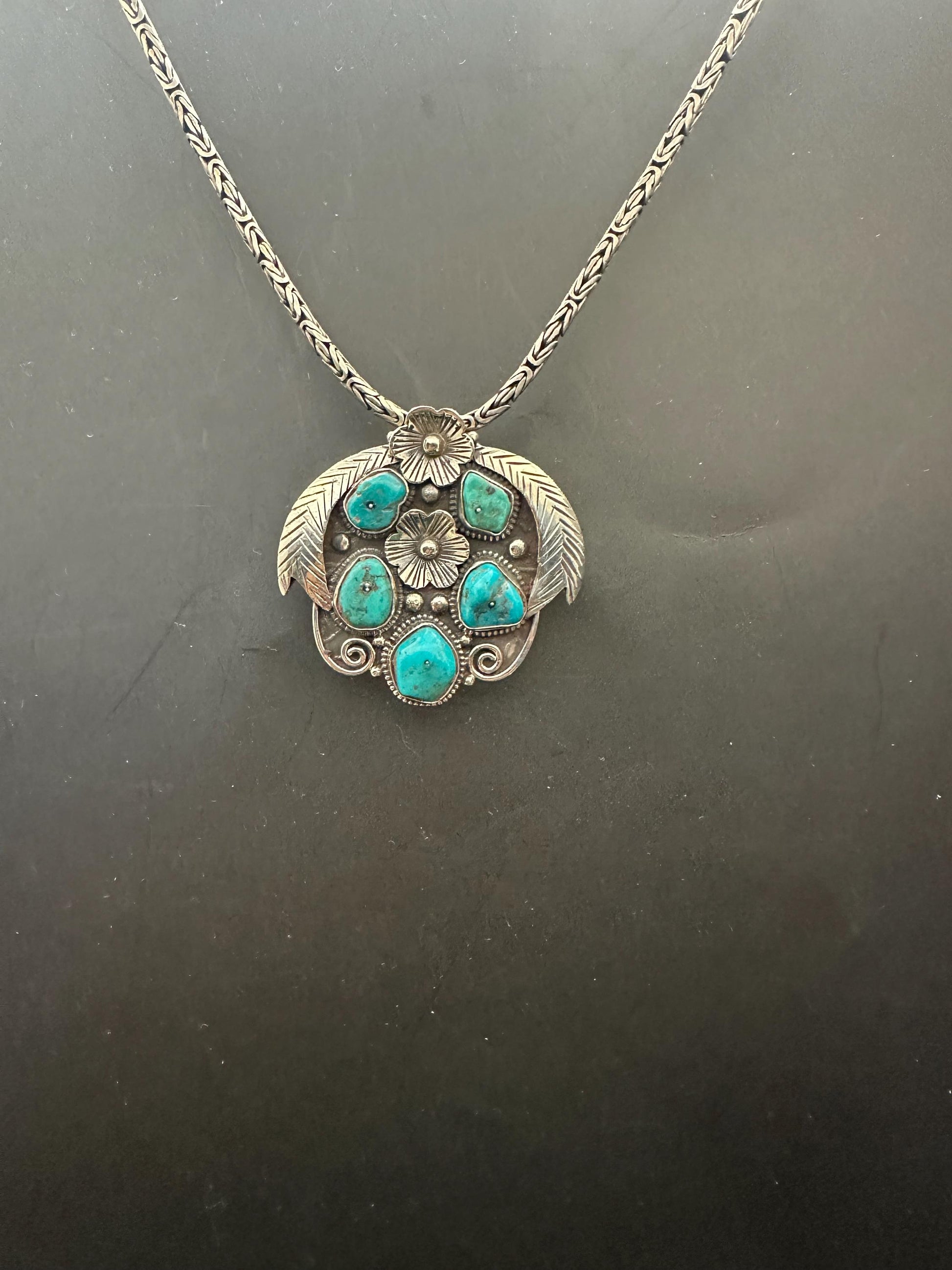 Turquoise pendent, untreated natural turquoise, master handcrafted with Tibetan silver from Nepal