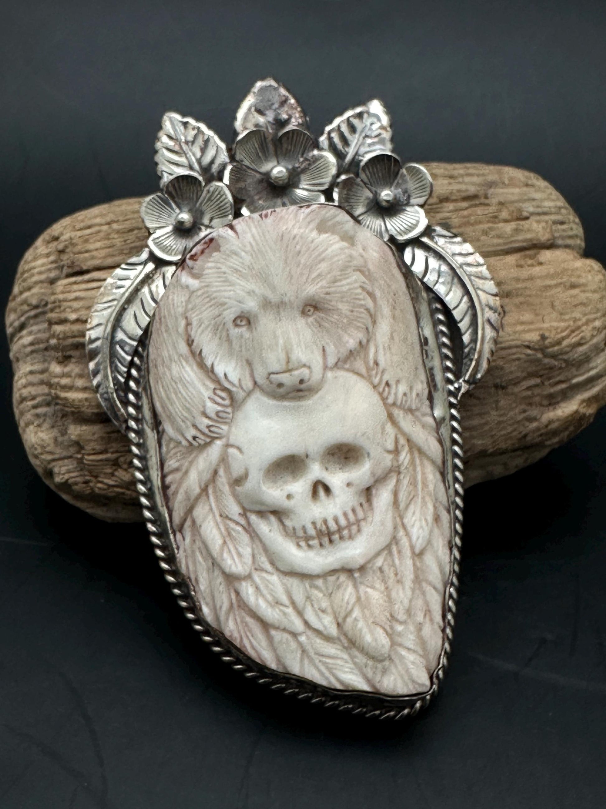 Bone skull with bear pendent, set with Tibetan silver
