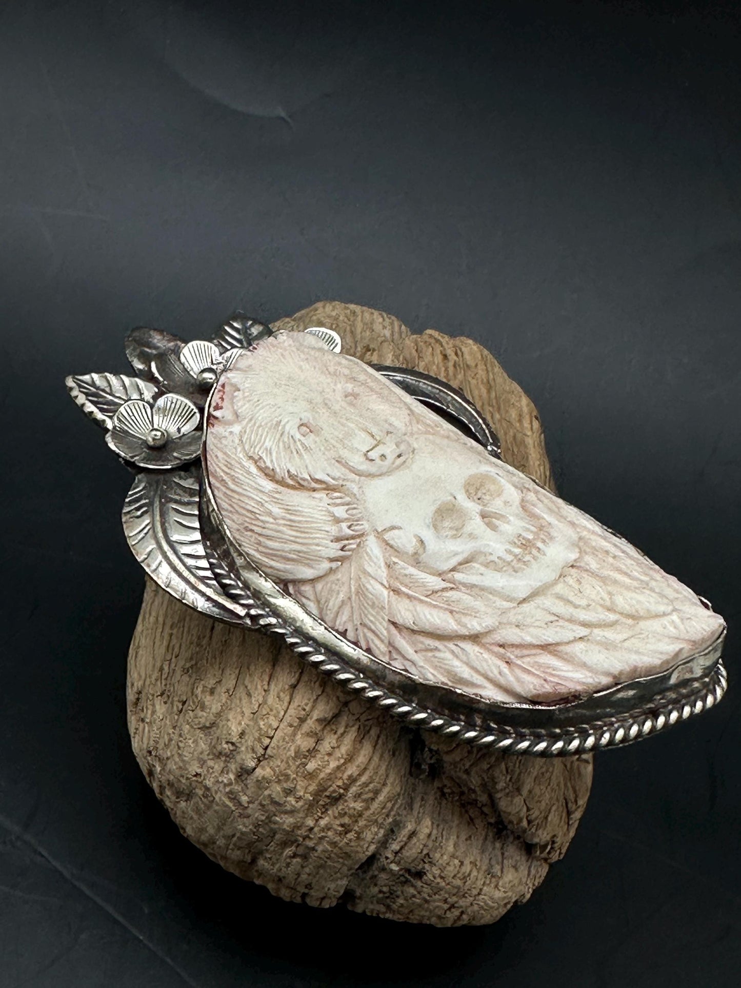 Bone skull with bear pendent, set with Tibetan silver